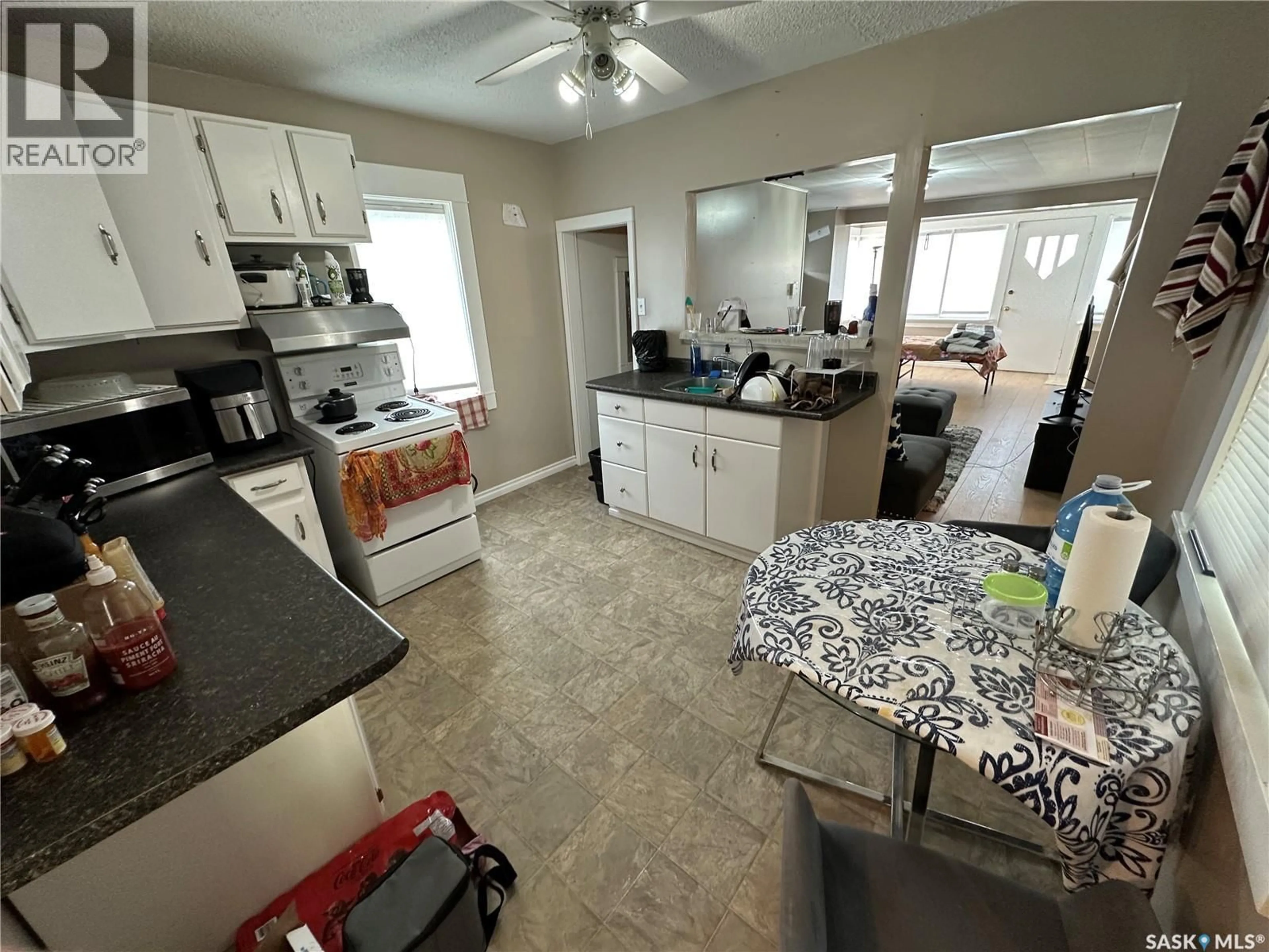 Open concept kitchen, ceramic/tile floor for 1005 9TH STREET, Rosthern Saskatchewan S0K3R0