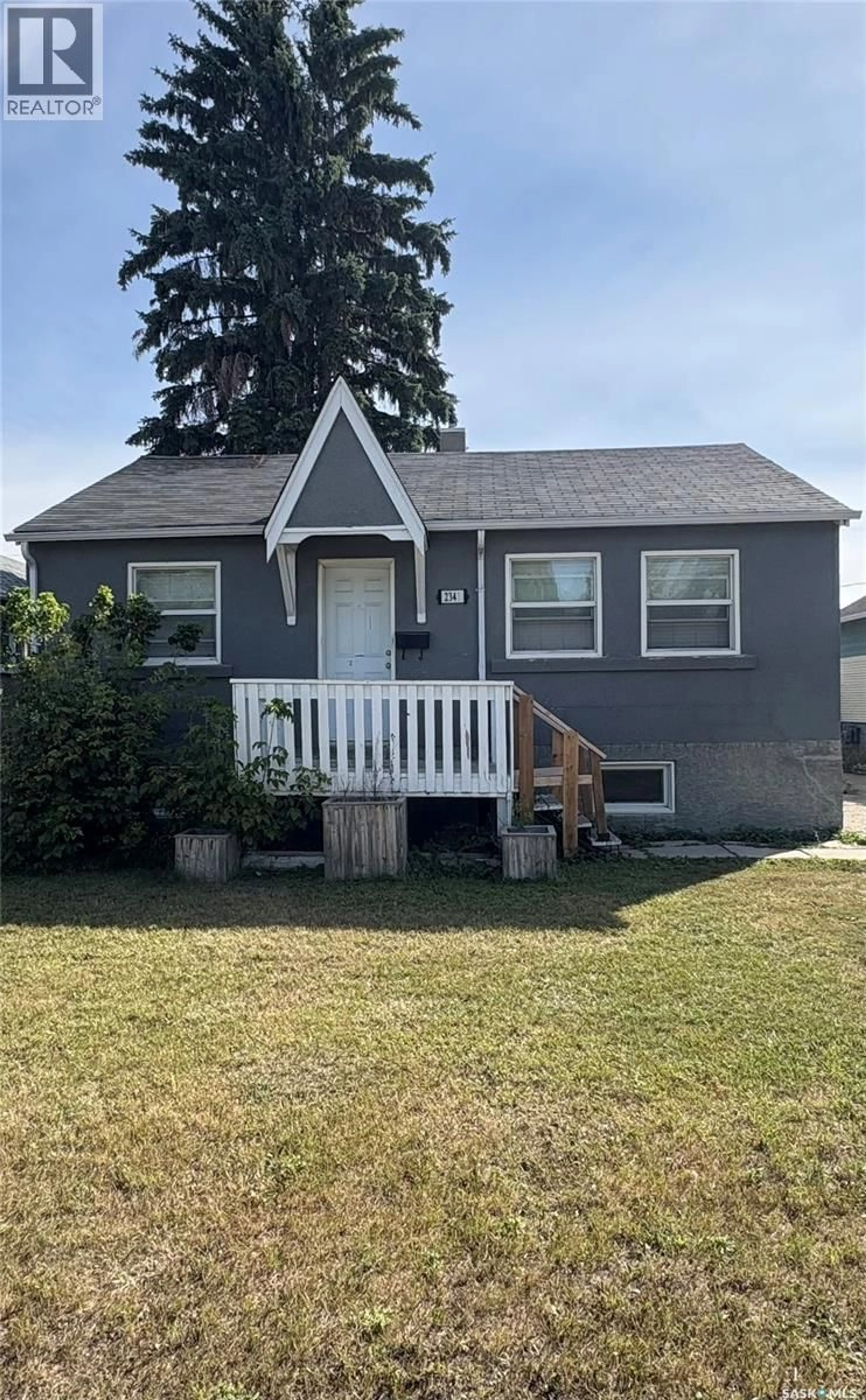 Home with vinyl exterior material, street for 2341 BRODER STREET, Regina Saskatchewan S4N3S9