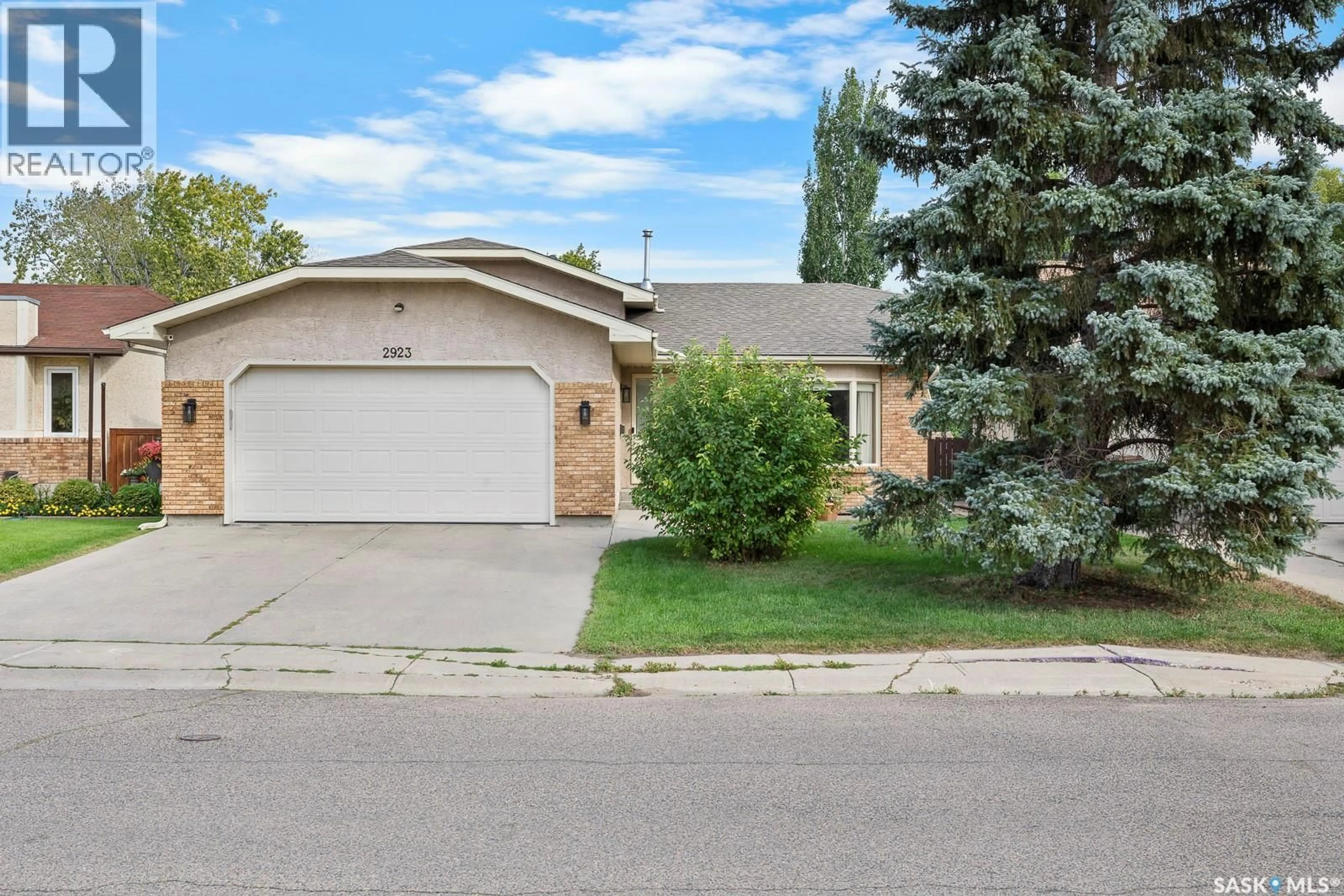 Home with vinyl exterior material, street for E - 2923 NEFF ROAD, Regina Saskatchewan S4V1X2