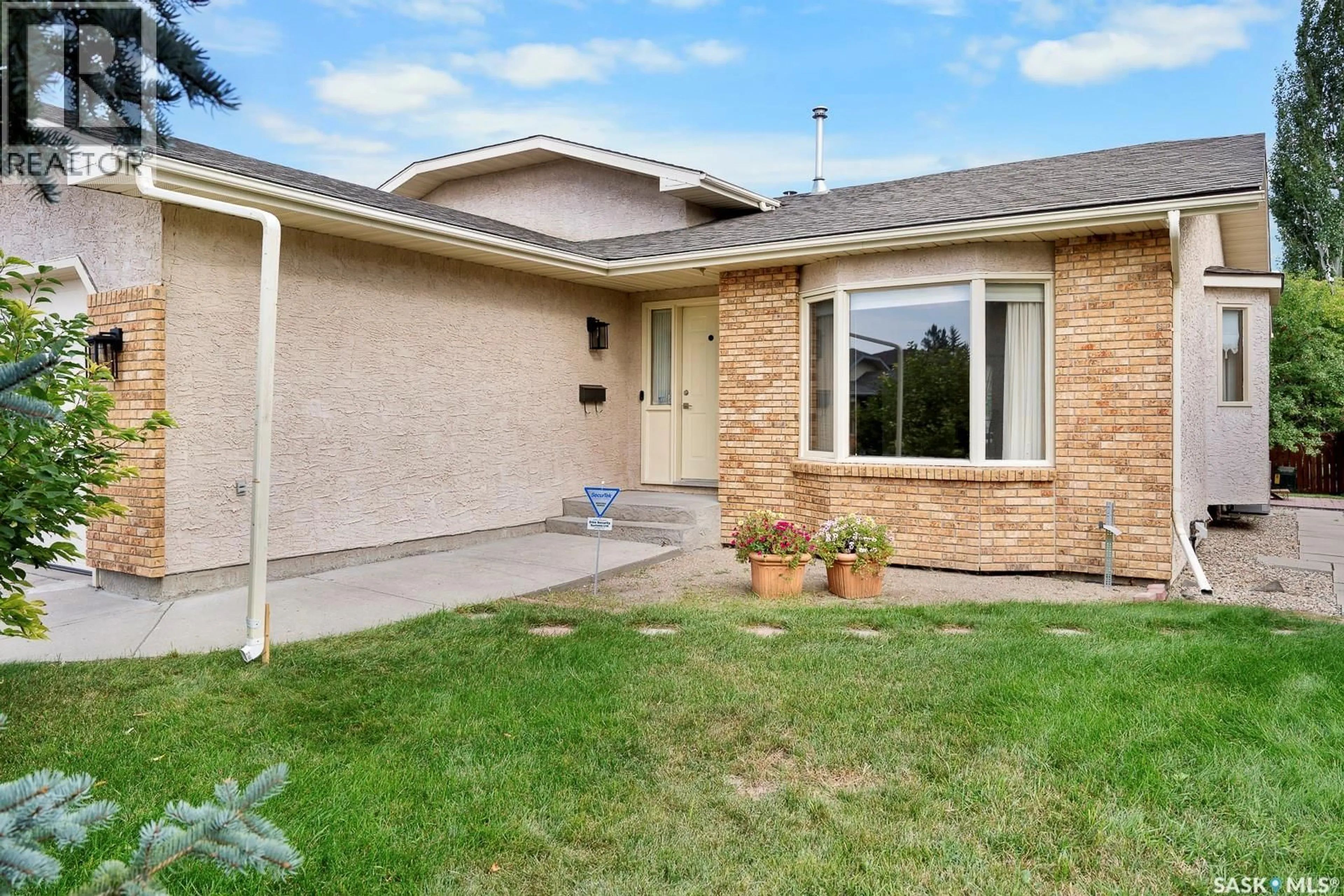 Home with brick exterior material, street for E - 2923 NEFF ROAD, Regina Saskatchewan S4V1X2