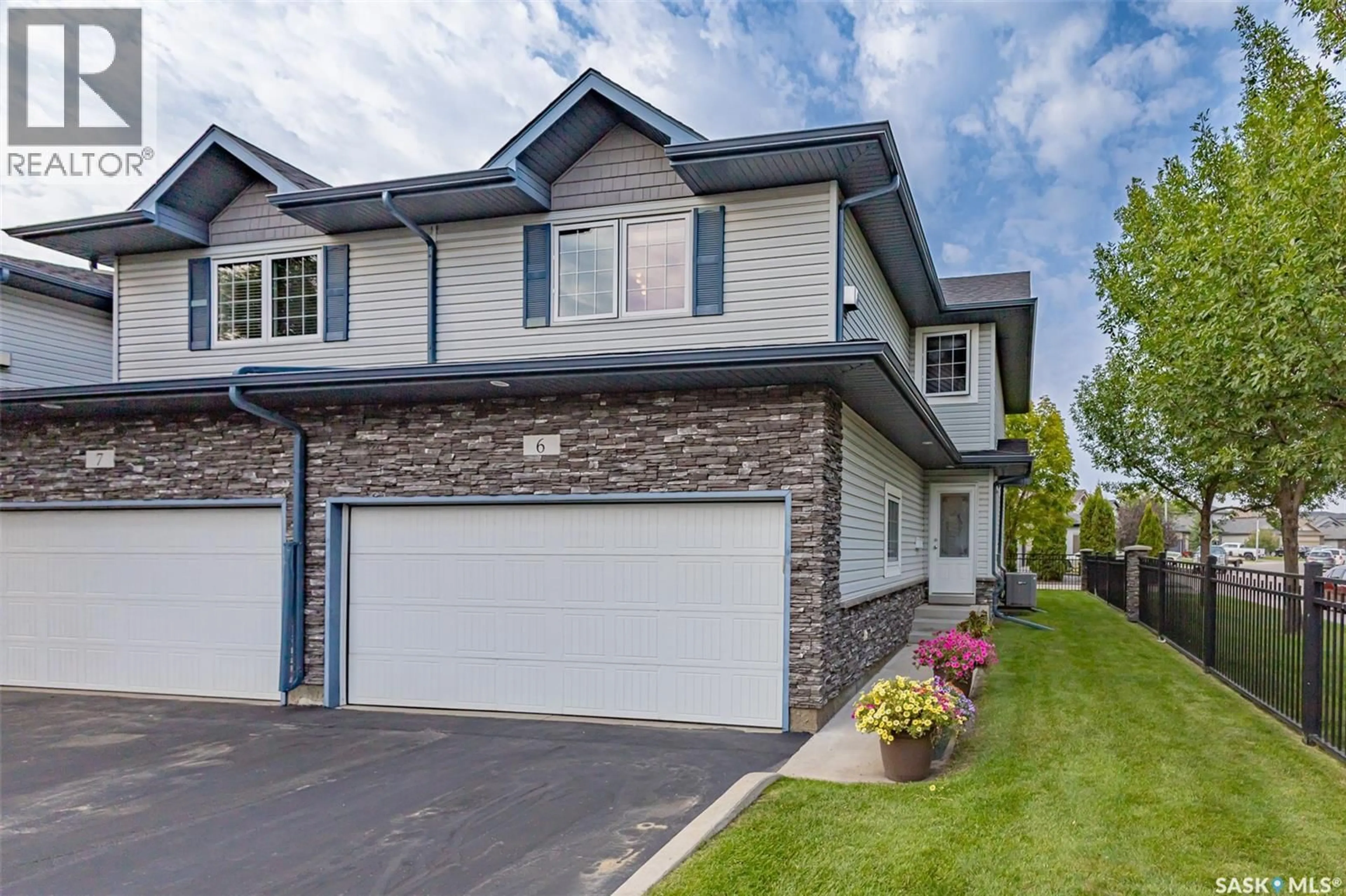 Home with vinyl exterior material, street for 110 - 6 DULMAGE CRESCENT, Saskatoon Saskatchewan S7T0C7