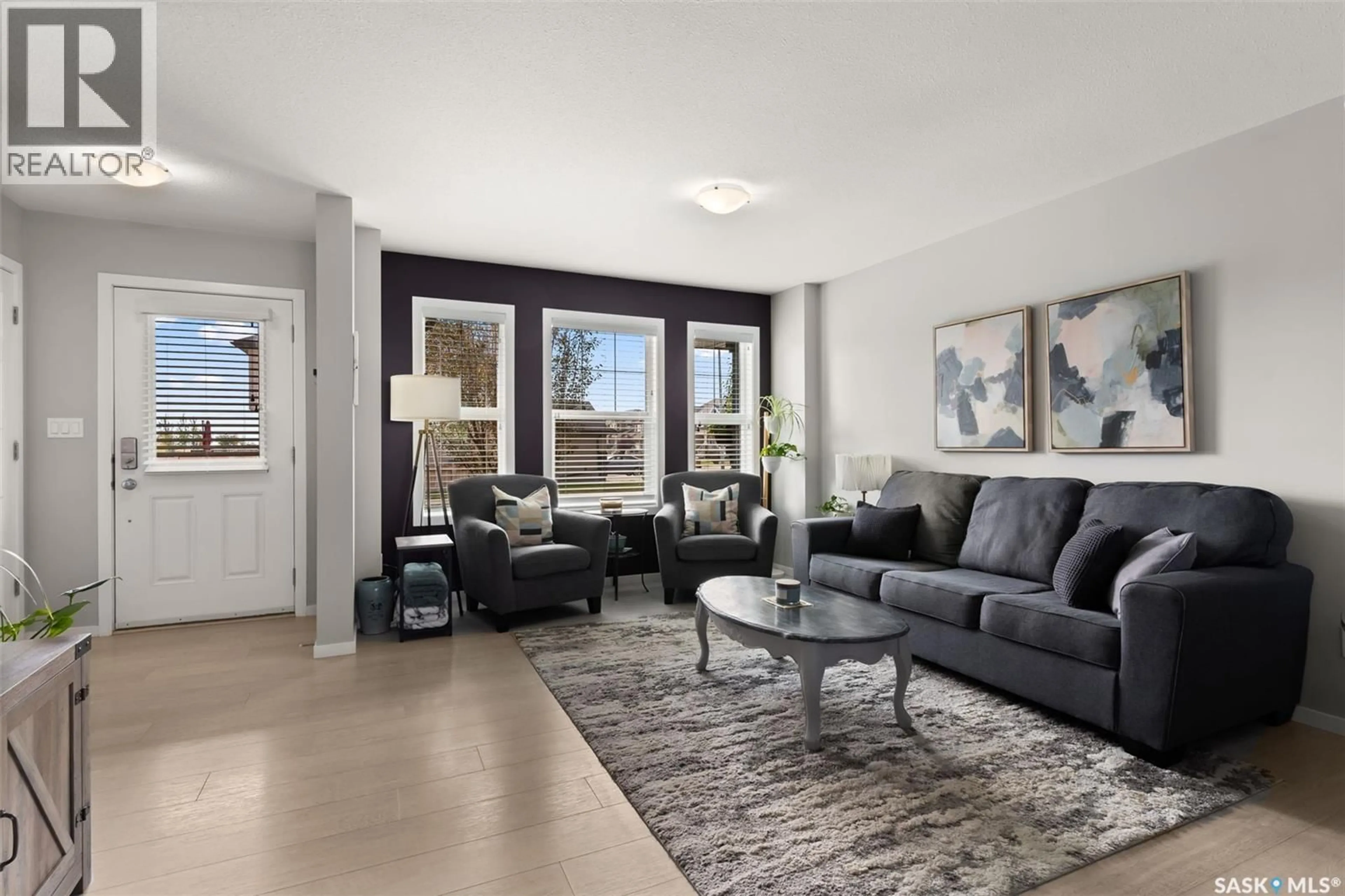 Living room with furniture, unknown for 8012 CANOLA AVENUE, Regina Saskatchewan S4Y0E7