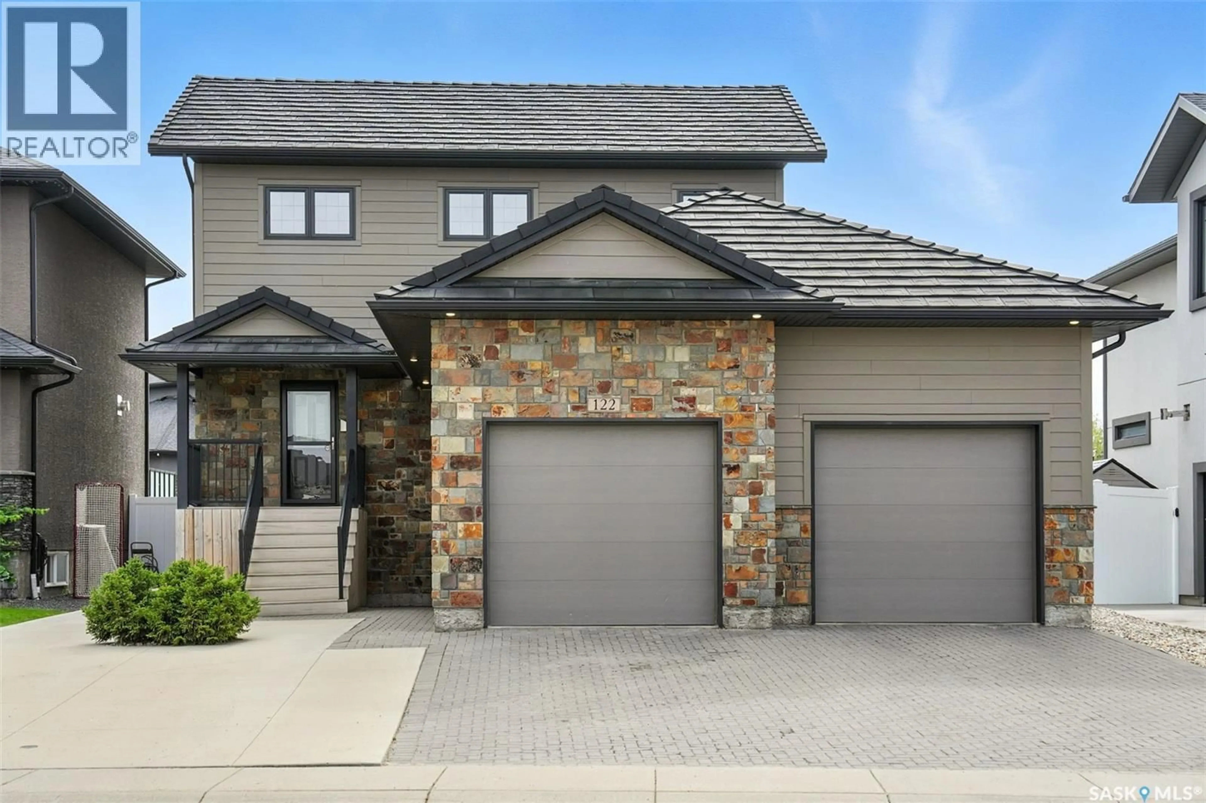 Home with brick exterior material, street for 122 ROY CRESCENT, Saskatoon Saskatchewan S7W0K9