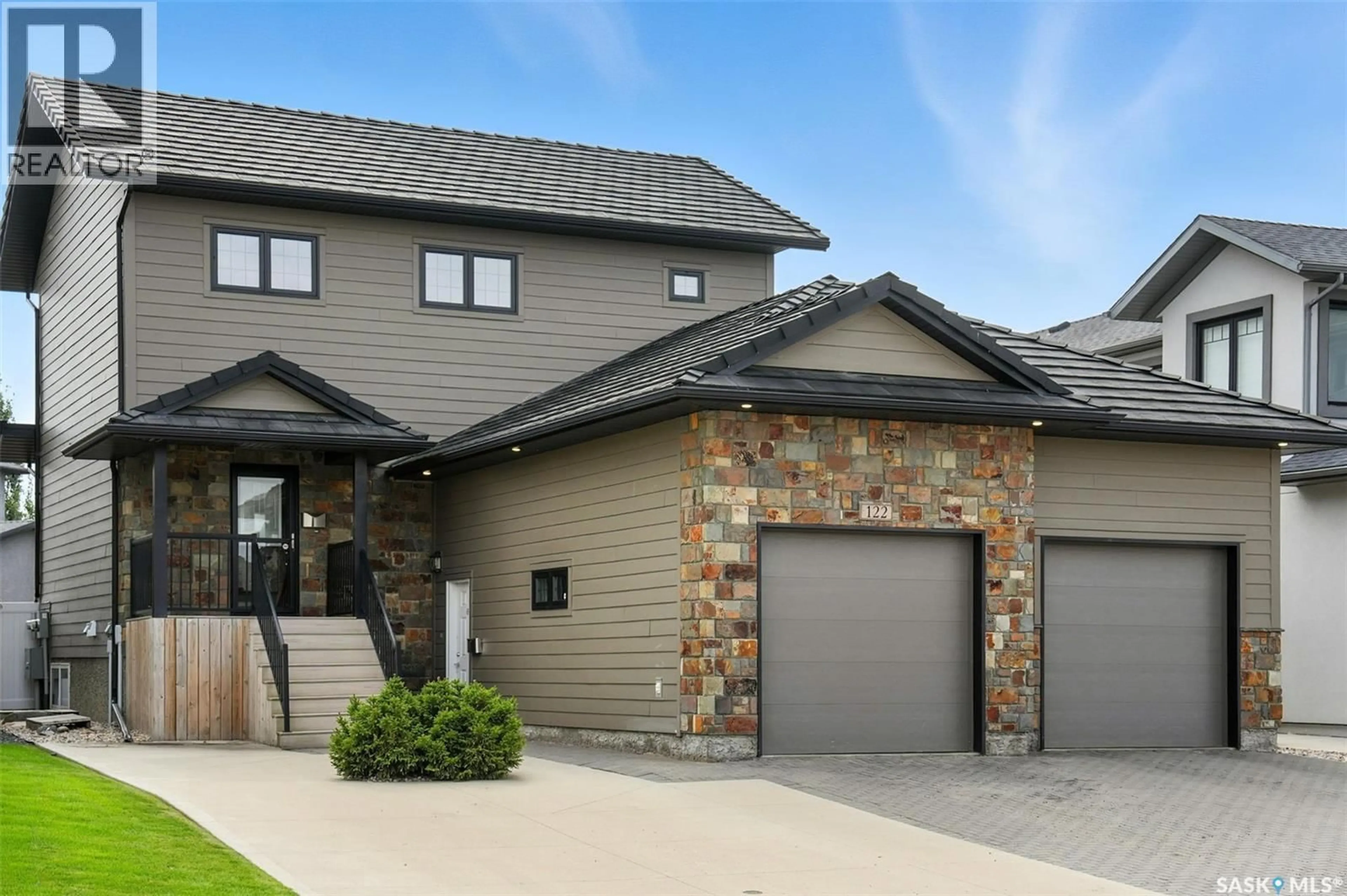 Home with brick exterior material, street for 122 ROY CRESCENT, Saskatoon Saskatchewan S7W0K9