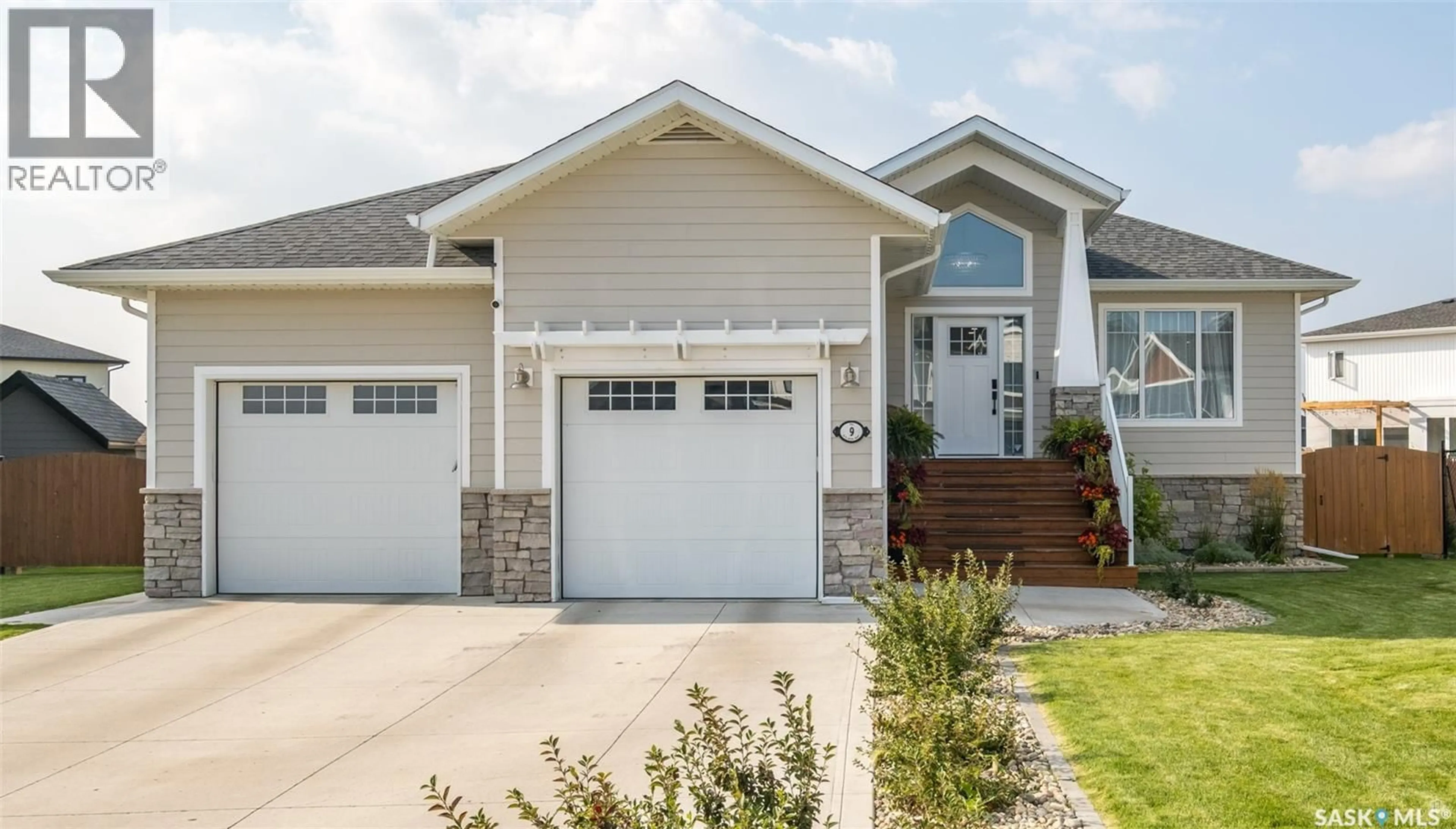 Home with vinyl exterior material, street for 9 WILSON BAY, Prince Albert Saskatchewan S6X0A6