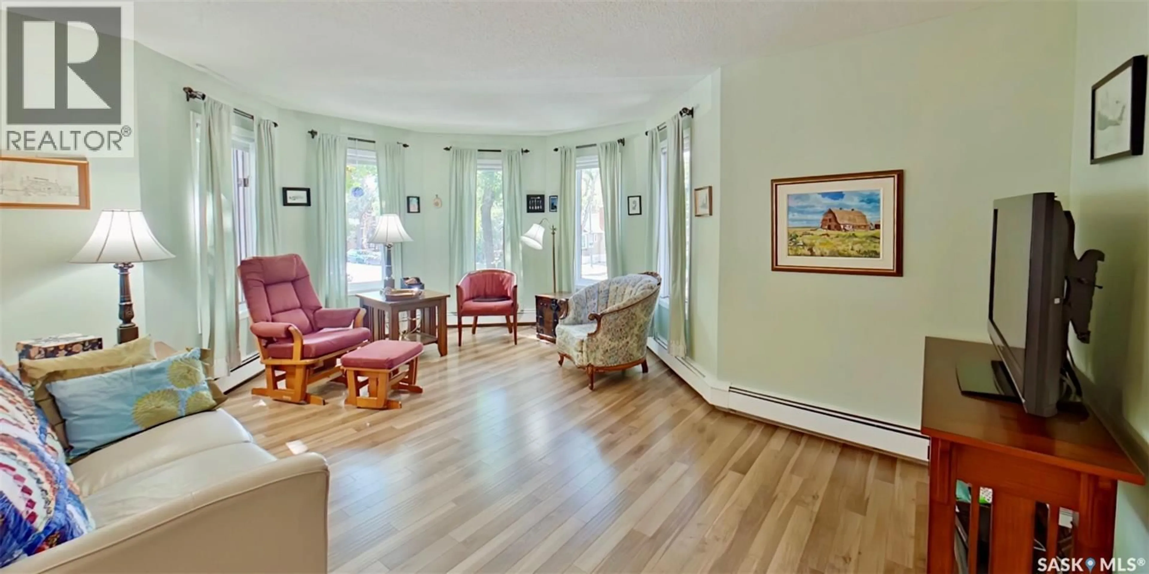 Living room with furniture, unknown for 204 - 2275 MCINTYRE STREET, Regina Saskatchewan S4P2S1