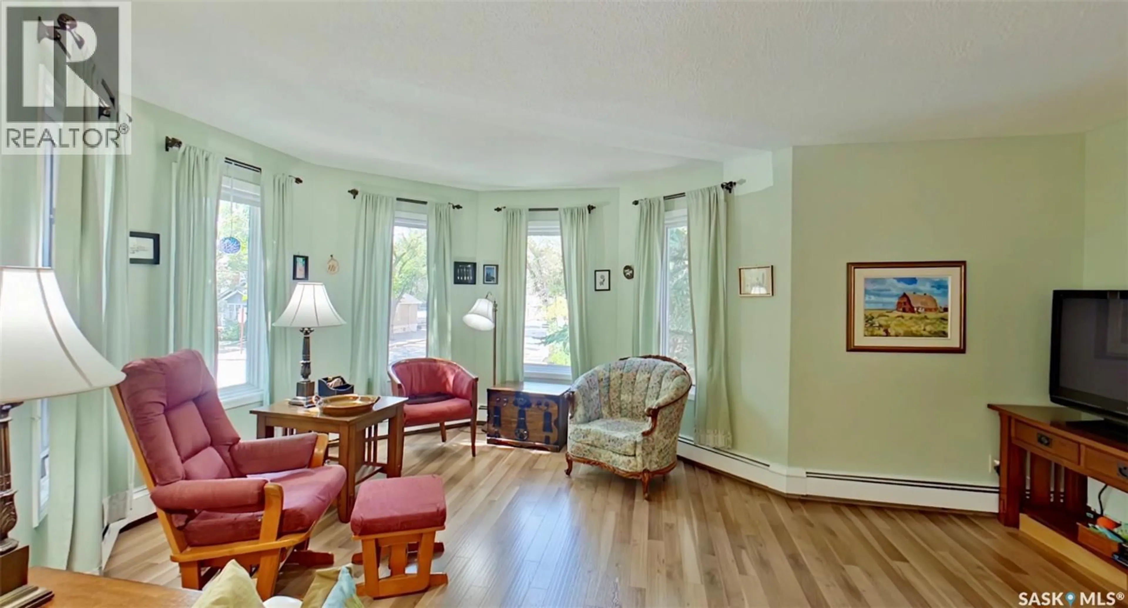 Living room with furniture, unknown for 204 - 2275 MCINTYRE STREET, Regina Saskatchewan S4P2S1