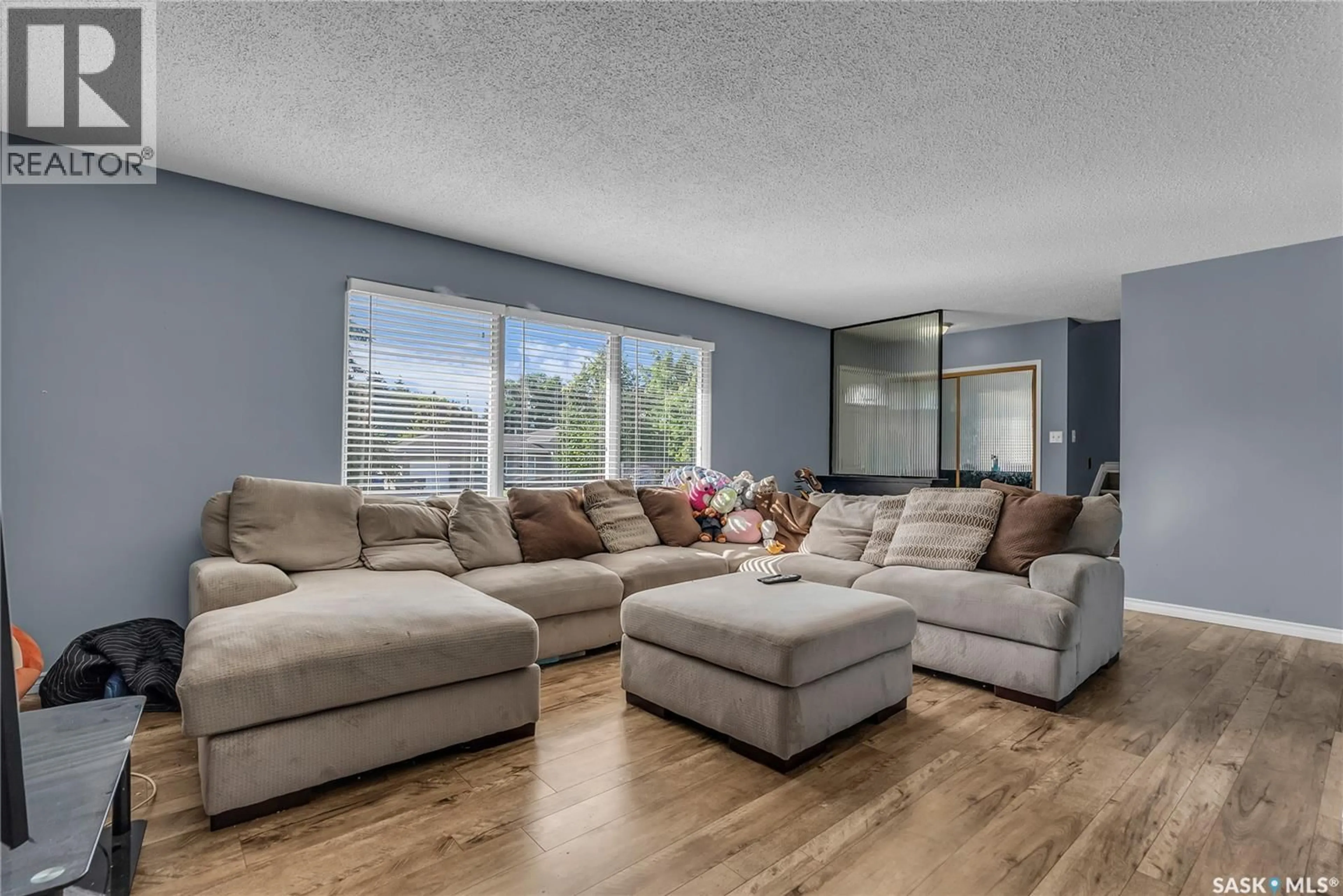 Living room with furniture, unknown for 15 MOXON CRESCENT, Saskatoon Saskatchewan S7H3B8