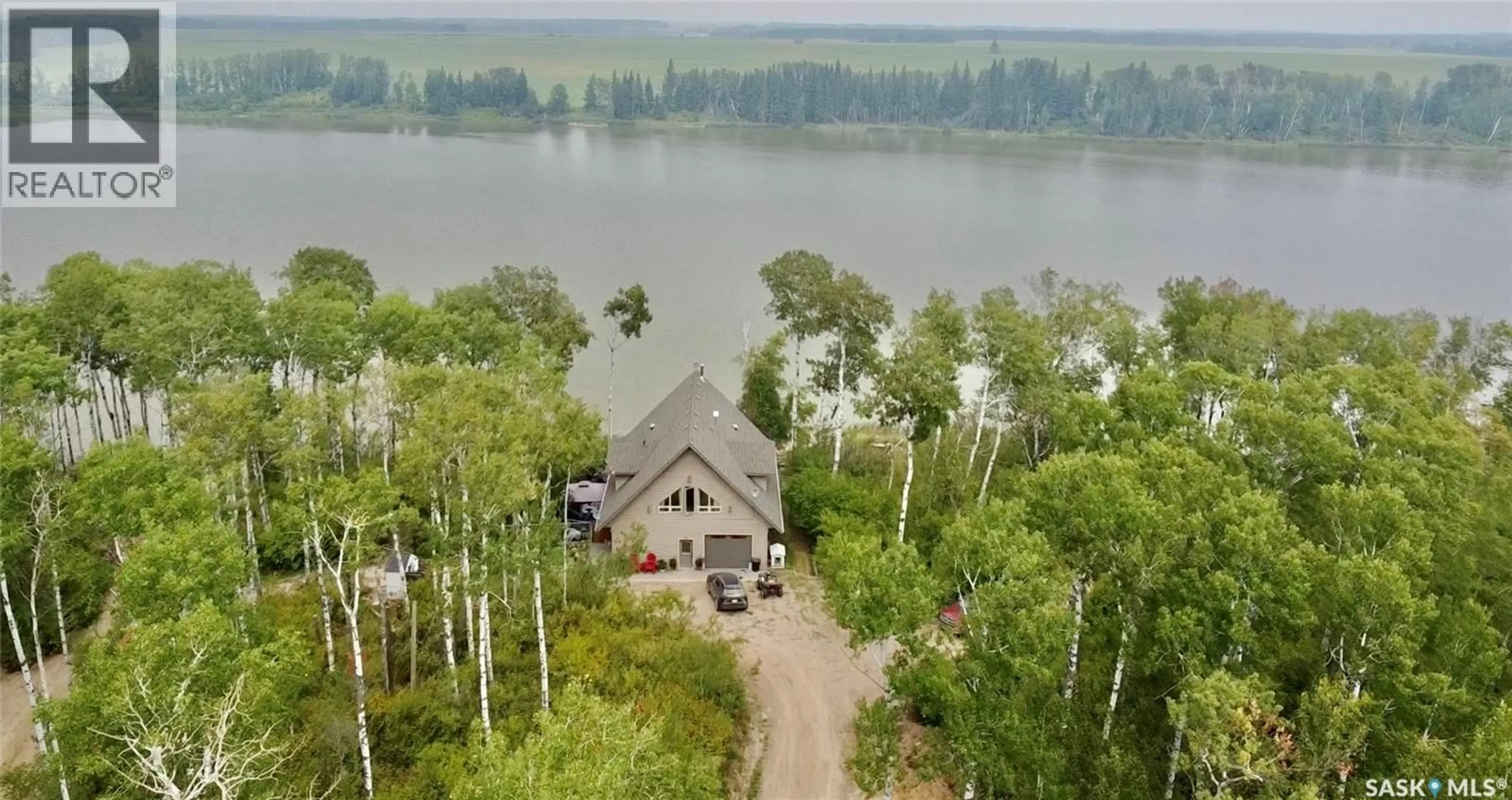 A pic from outside/outdoor area/front of a property/back of a property/a pic from drone, water/lake/river/ocean view for FILLON LAKE WATERFRONT ACREAGE, Canwood Rm No. 494 Saskatchewan S0J0K0