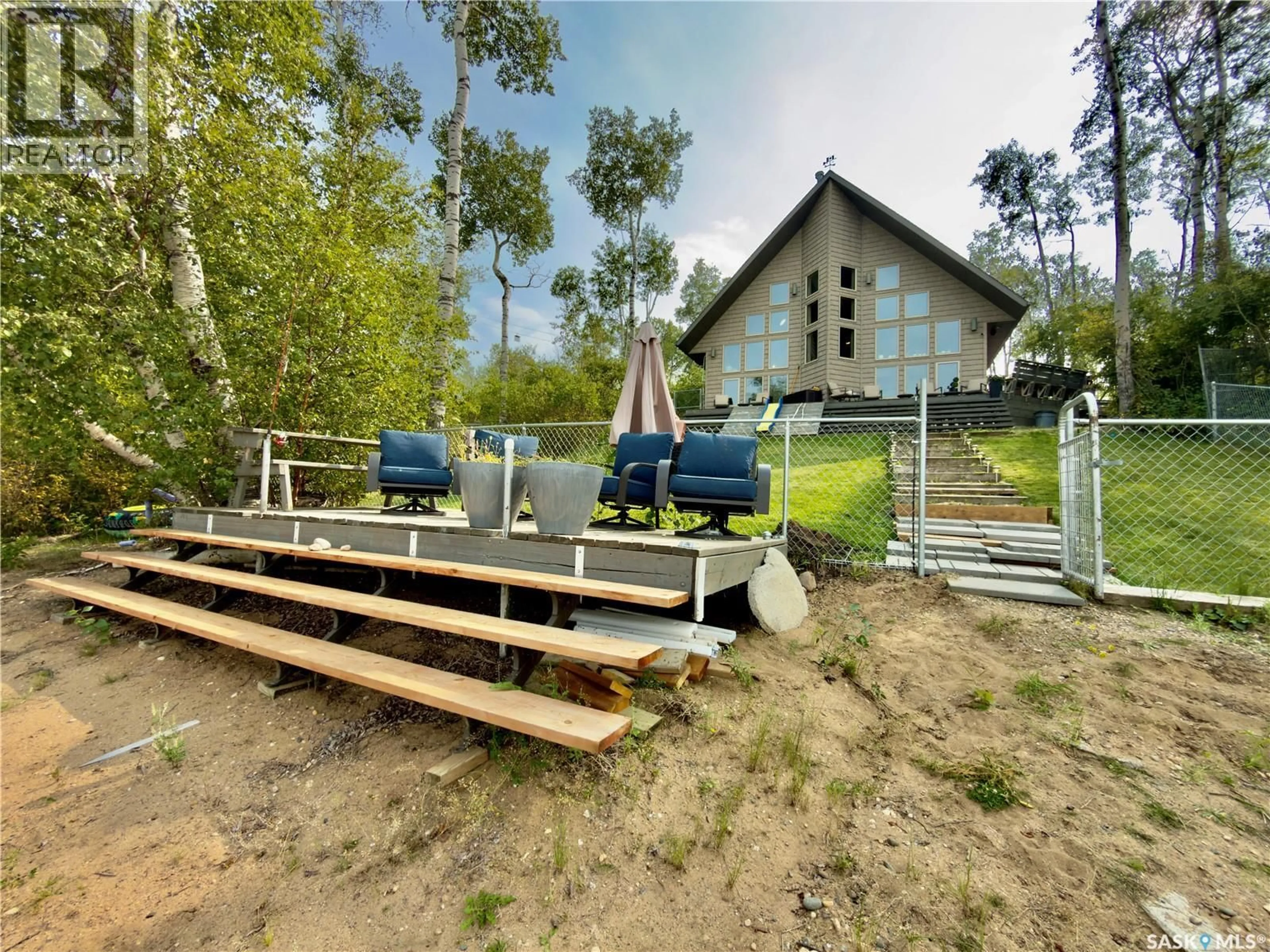 A pic from outside/outdoor area/front of a property/back of a property/a pic from drone, building for FILLON LAKE WATERFRONT ACREAGE, Canwood Rm No. 494 Saskatchewan S0J0K0
