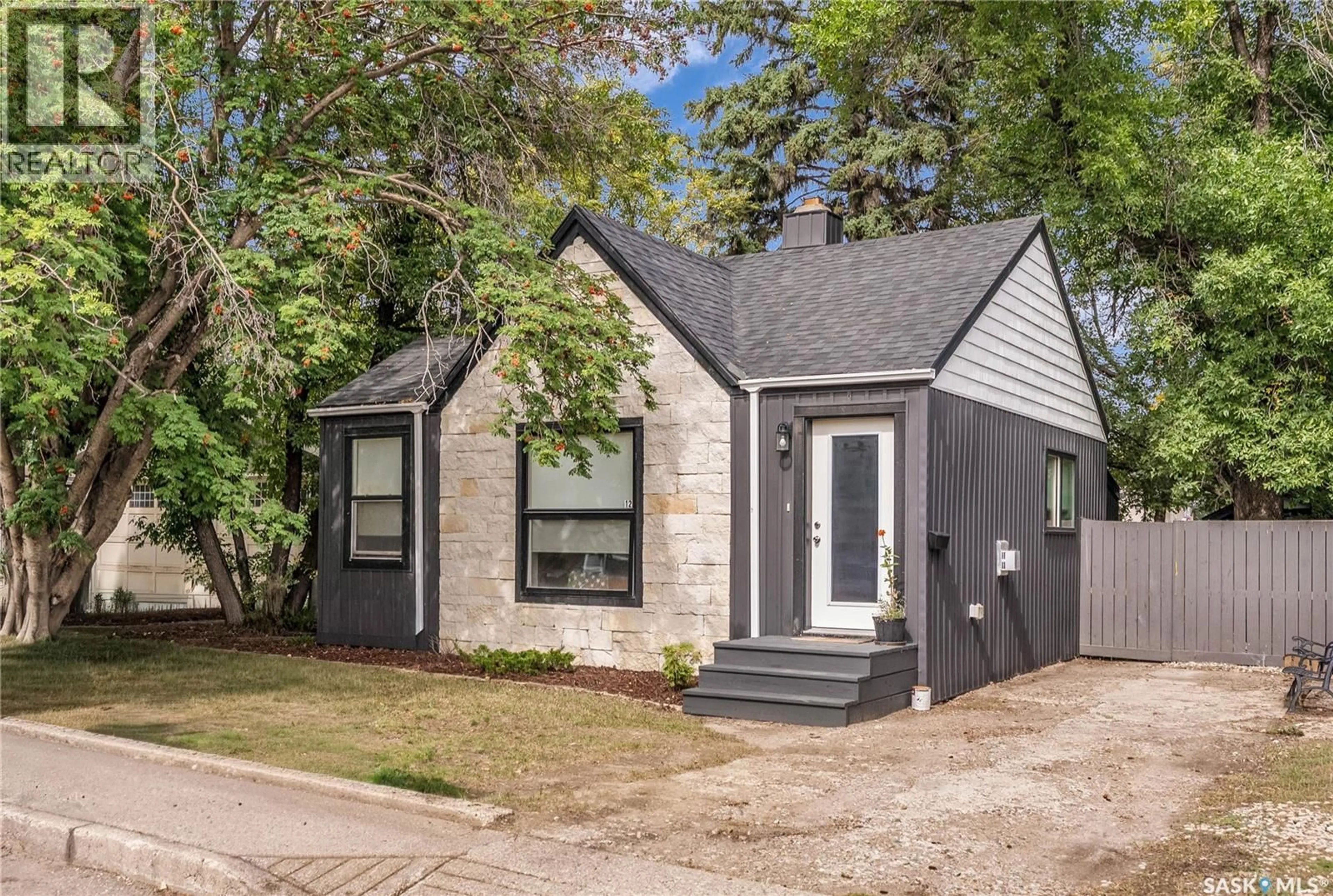 Home with vinyl exterior material, street for 12 CONNAUGHT PLACE, Saskatoon Saskatchewan S7L1C7