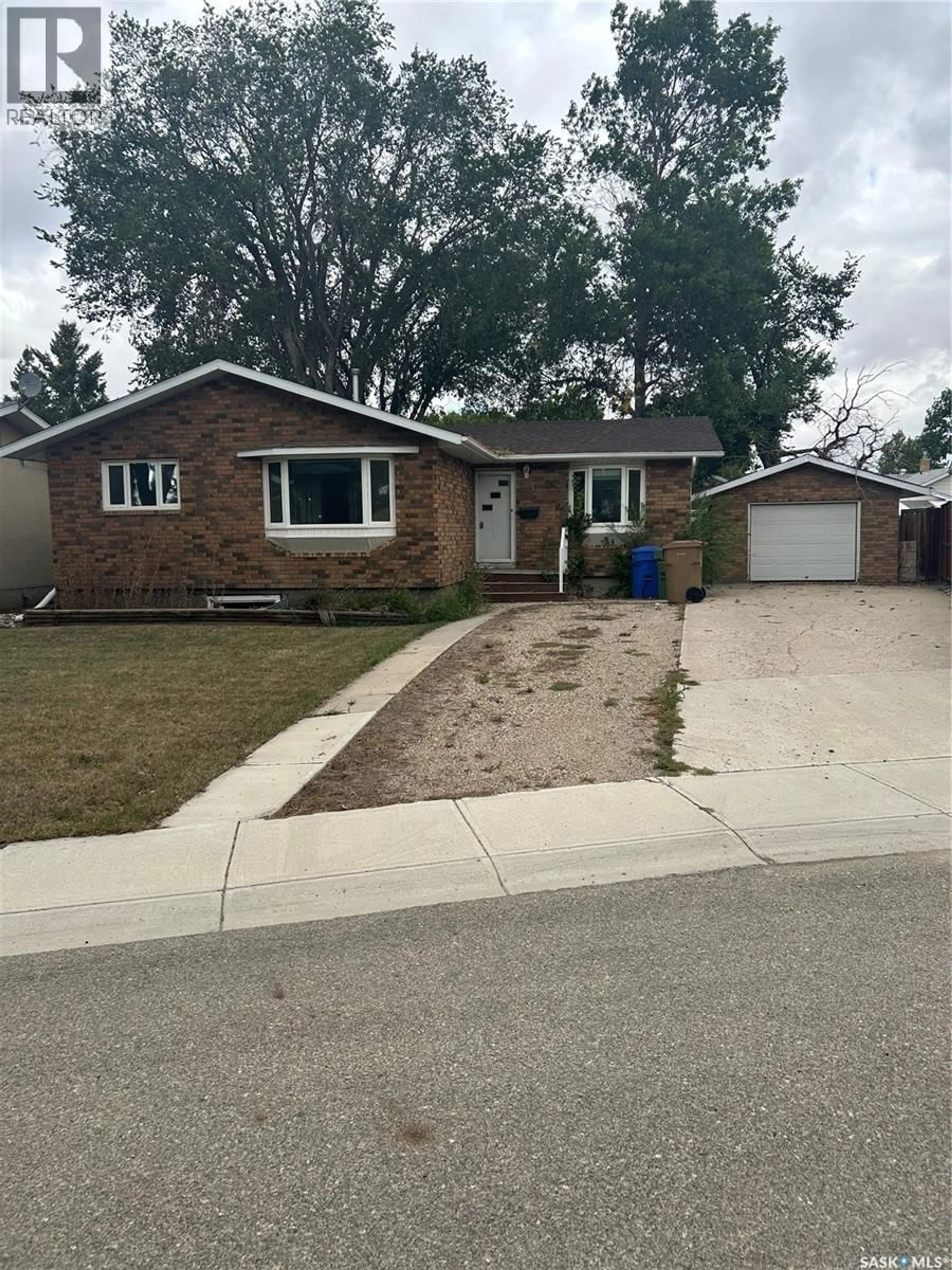 Home with brick exterior material, street for 38 MILFORD CRESCENT, Regina Saskatchewan S4N1K7