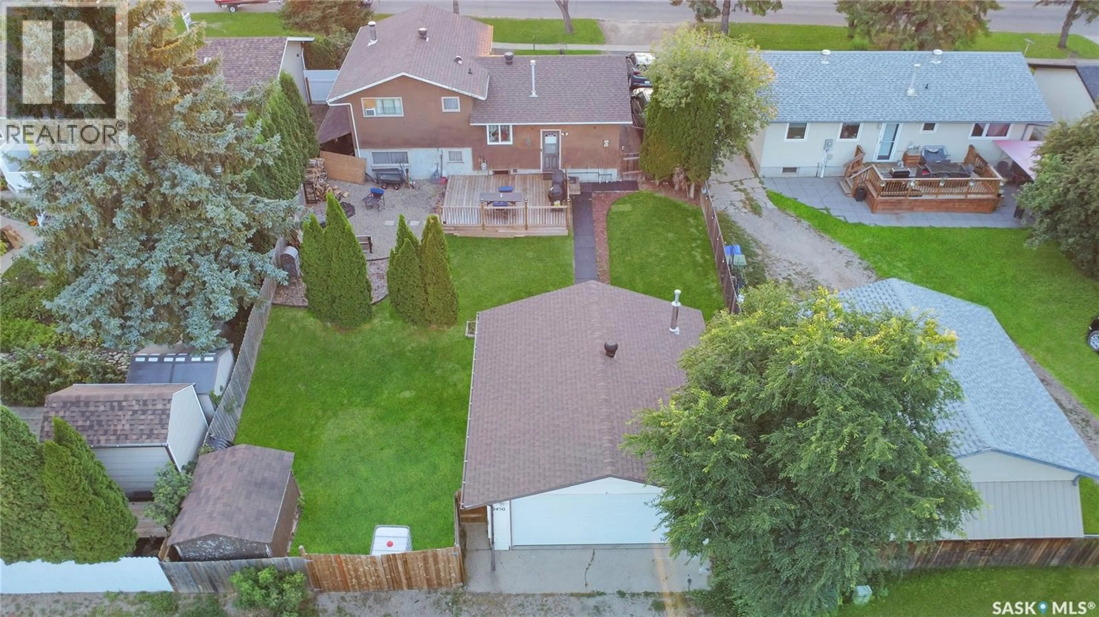A pic from outside/outdoor area/front of a property/back of a property/a pic from drone, street for 2450 15TH AVENUE, Prince Albert Saskatchewan S6V6J1
