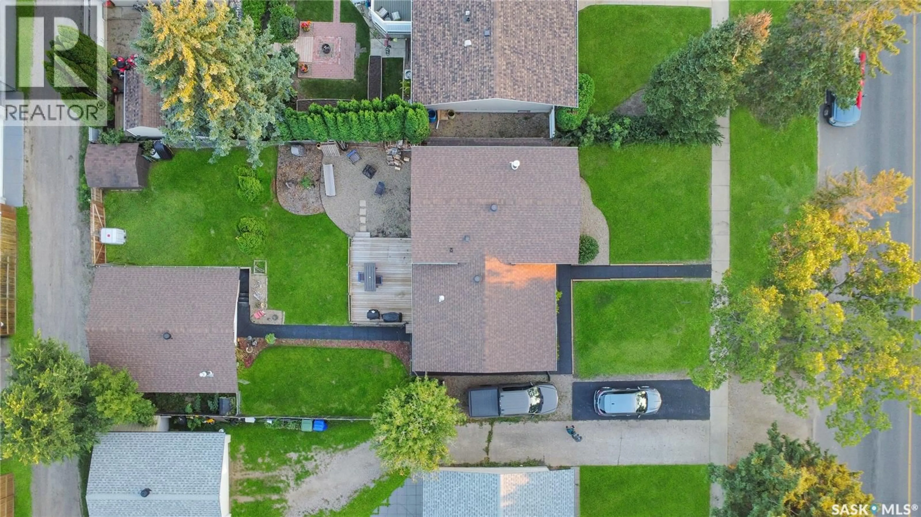 A pic from outside/outdoor area/front of a property/back of a property/a pic from drone, street for 2450 15TH AVENUE, Prince Albert Saskatchewan S6V6J1