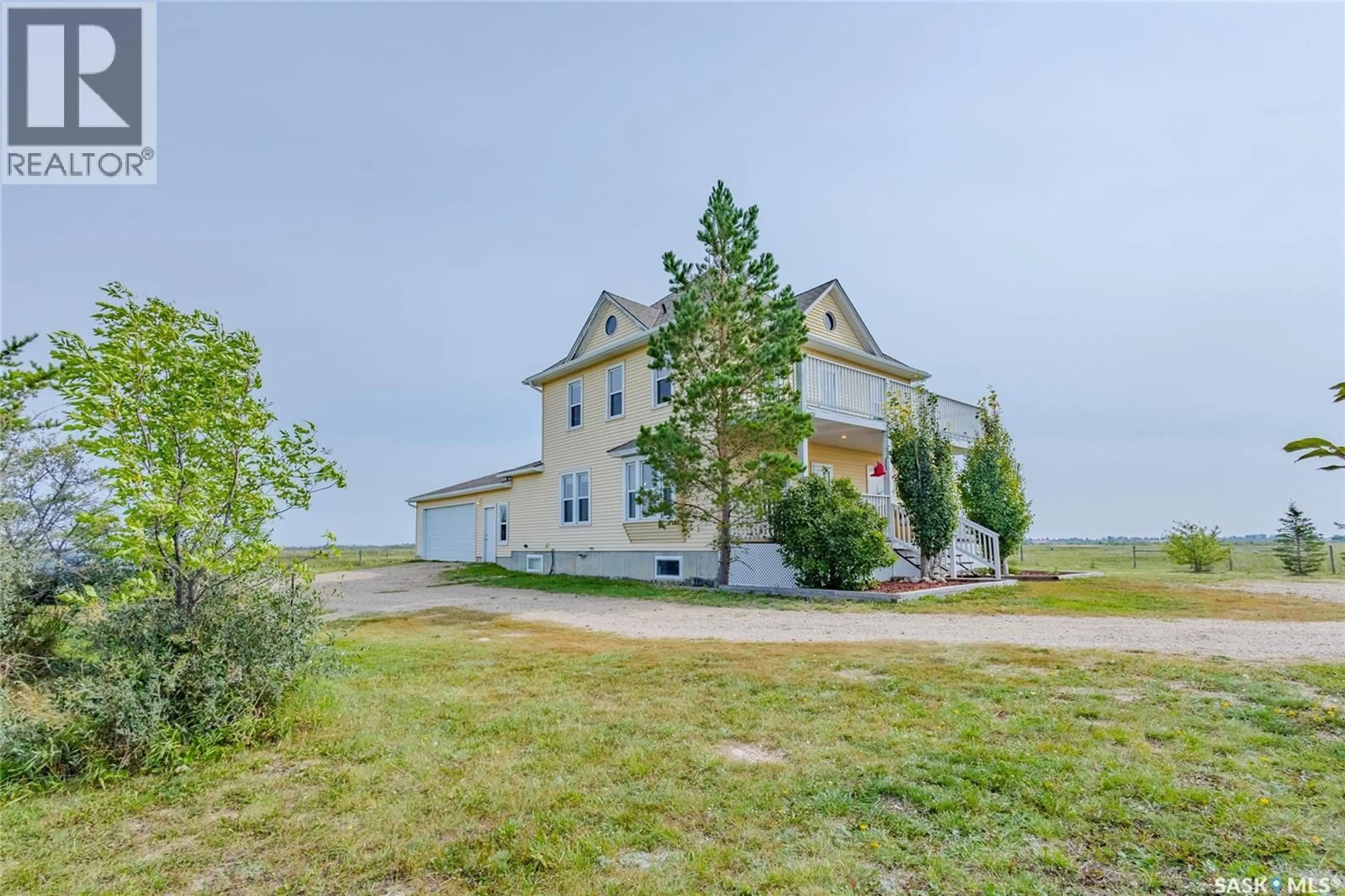 A pic from outside/outdoor area/front of a property/back of a property/a pic from drone, water/lake/river/ocean view for MARTENSVILLE ACREAGE, Corman Park Rm No. 344 Saskatchewan S0K2T0