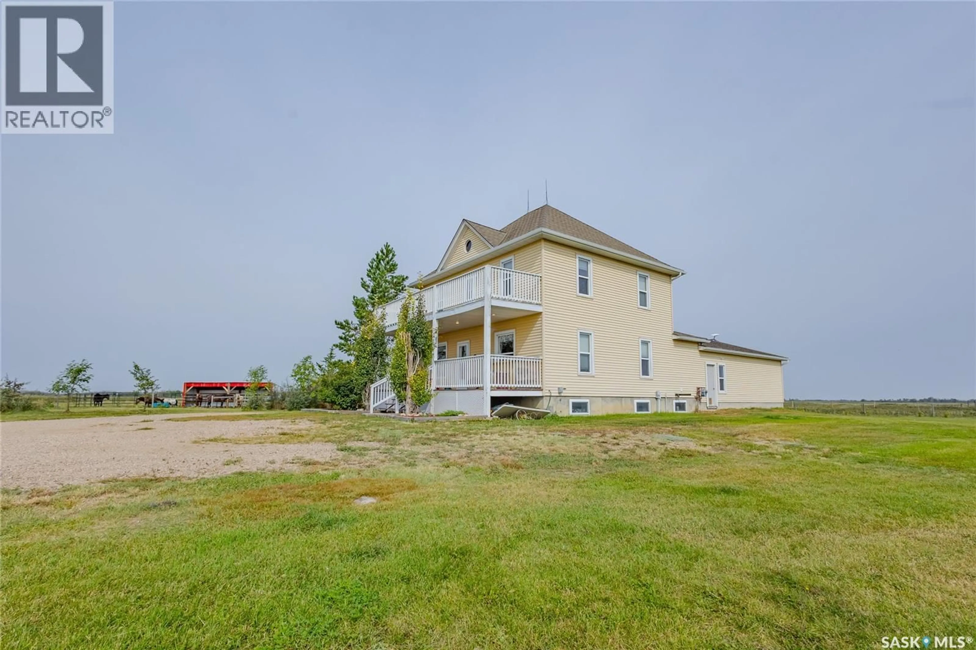 A pic from outside/outdoor area/front of a property/back of a property/a pic from drone, water/lake/river/ocean view for MARTENSVILLE ACREAGE, Corman Park Rm No. 344 Saskatchewan S0K2T0