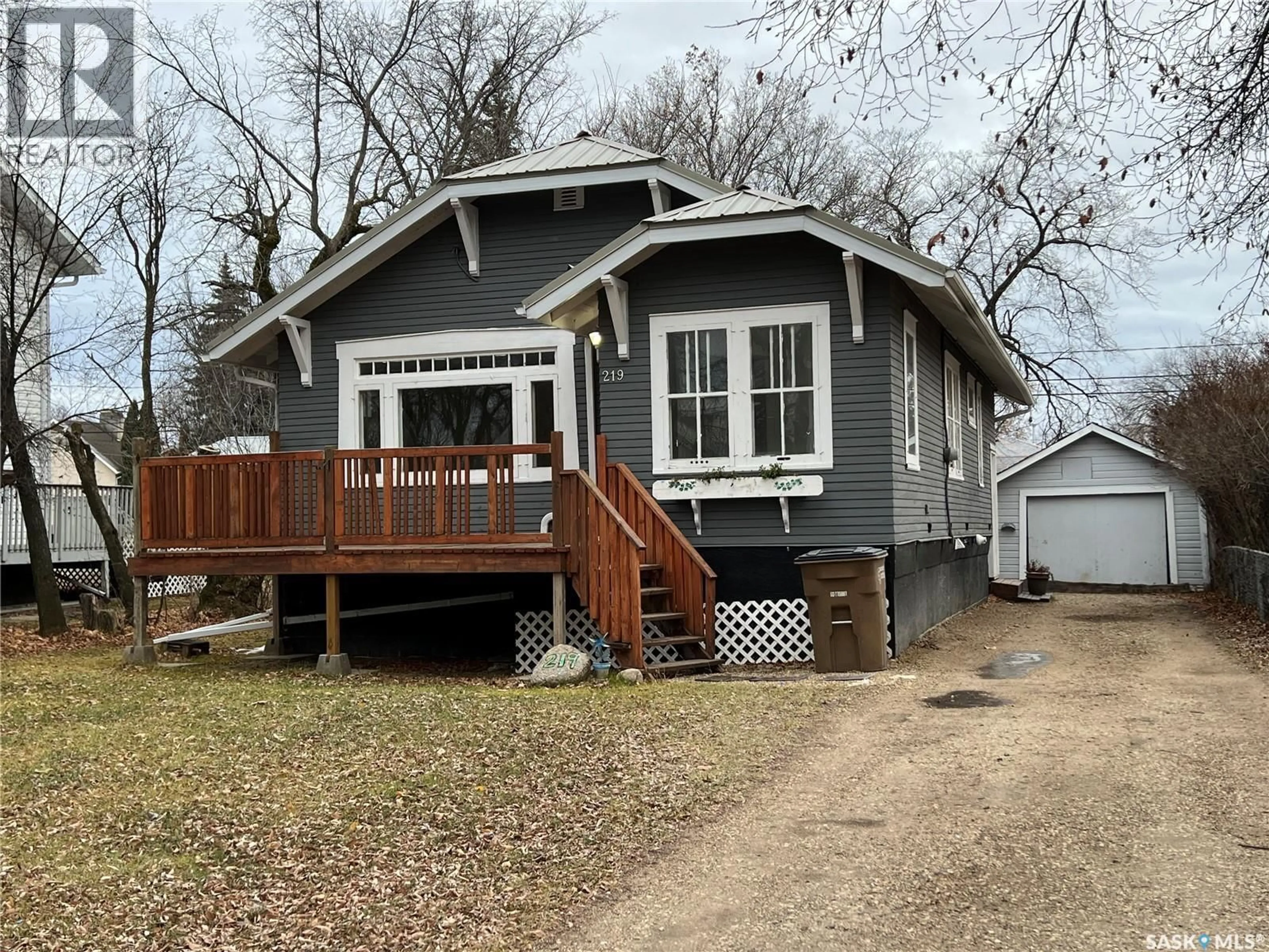 Home with vinyl exterior material, street for 219 MACLEOD AVENUE, Melfort Saskatchewan S0E1A0