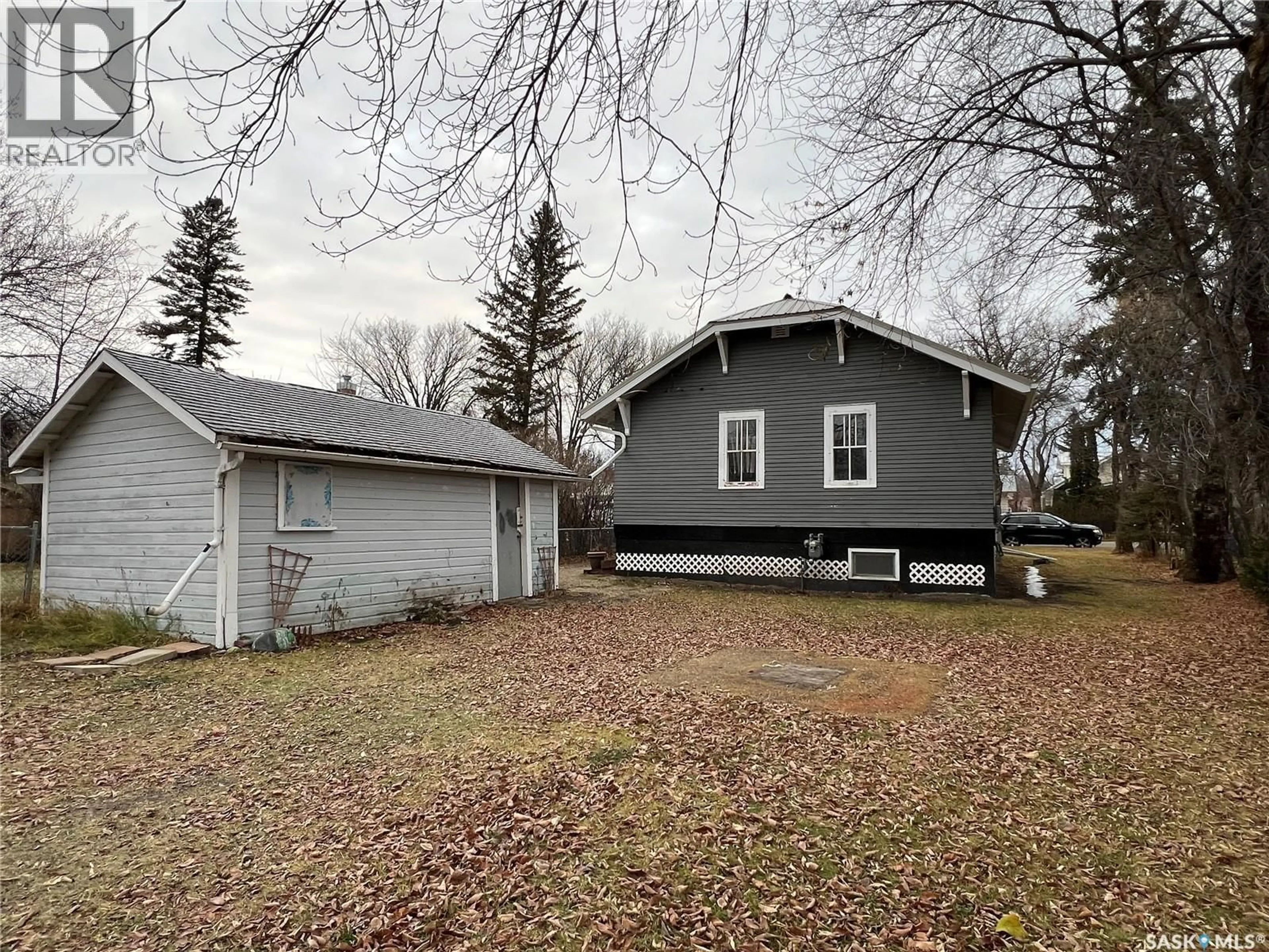 A pic from outside/outdoor area/front of a property/back of a property/a pic from drone, street for 219 MACLEOD AVENUE, Melfort Saskatchewan S0E1A0