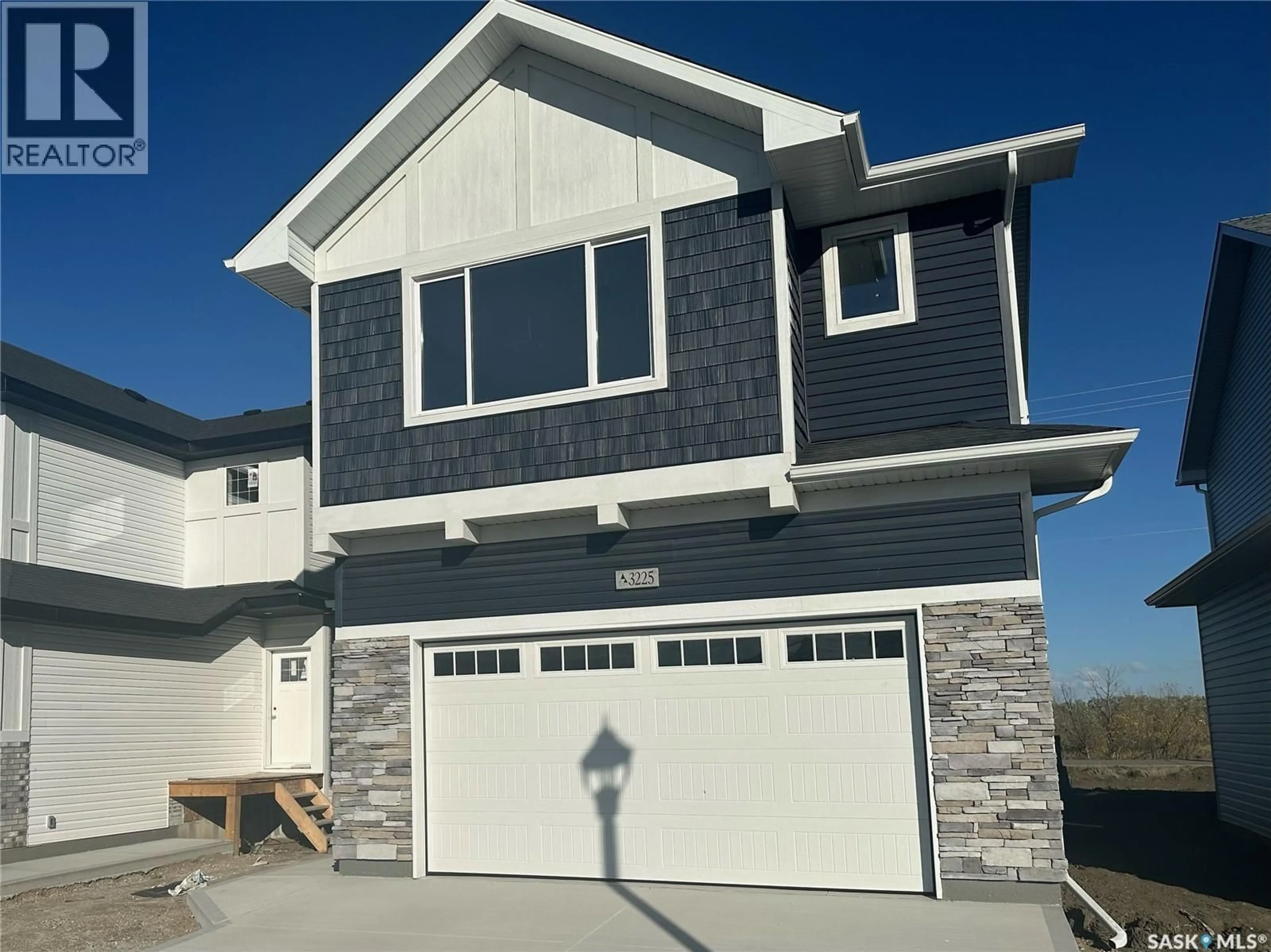Home with vinyl exterior material, street for 3114 BOWEN STREET, Regina Saskatchewan S4V4C6