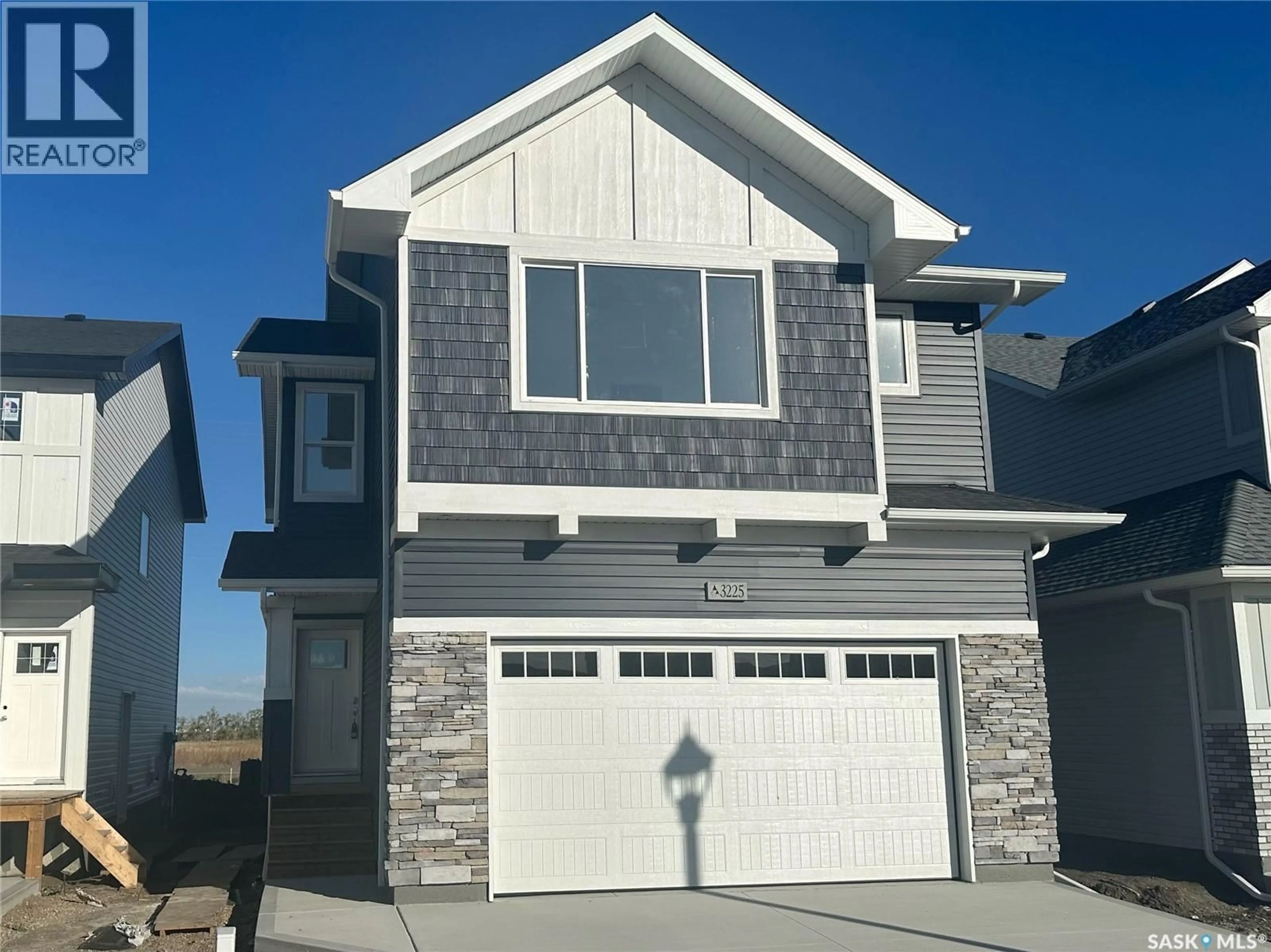Home with vinyl exterior material, street for 3114 BOWEN STREET, Regina Saskatchewan S4V4C6