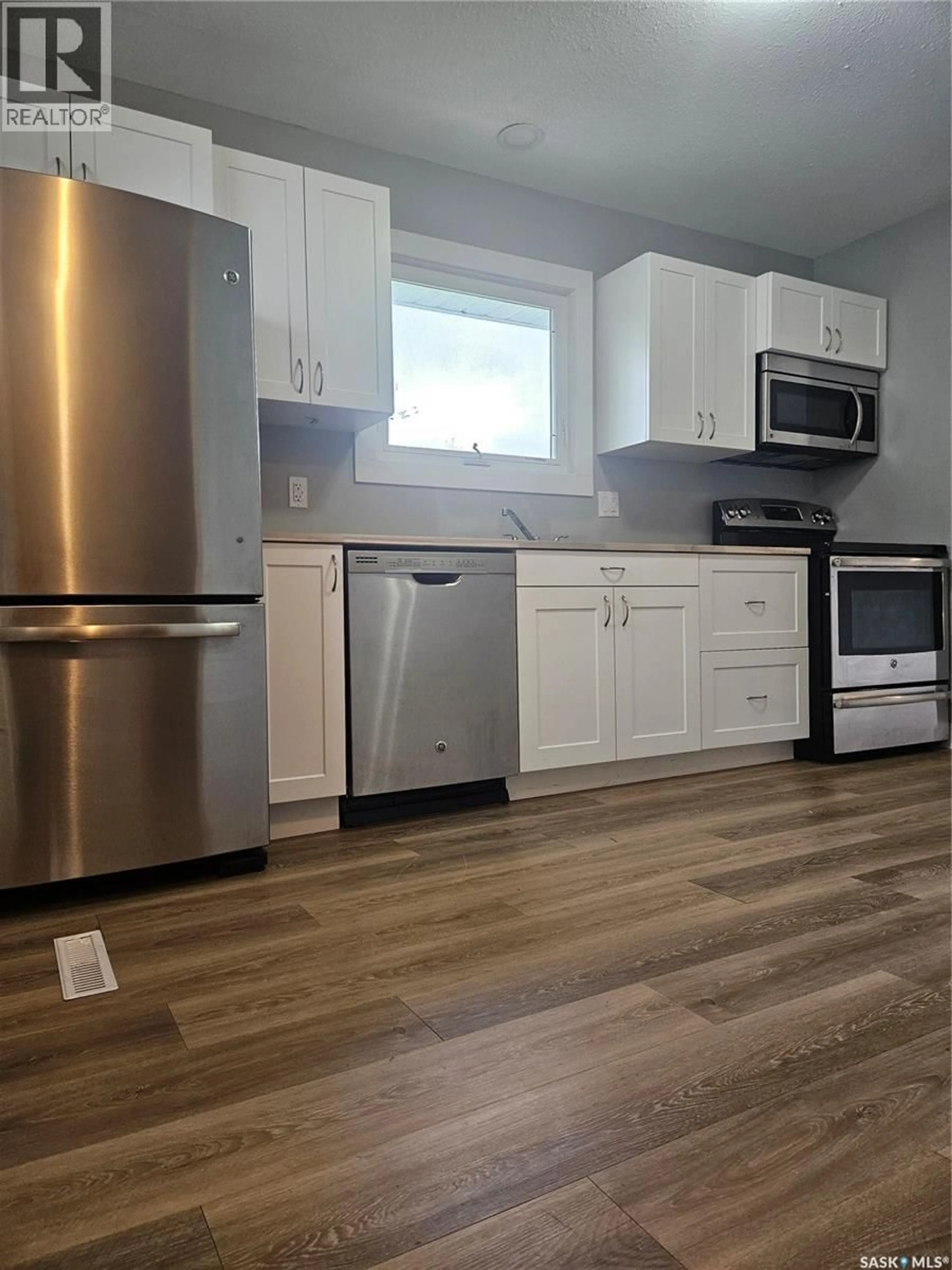Standard kitchen, wood/laminate floor for 1305 96TH STREET, Tisdale Saskatchewan S0E1T0