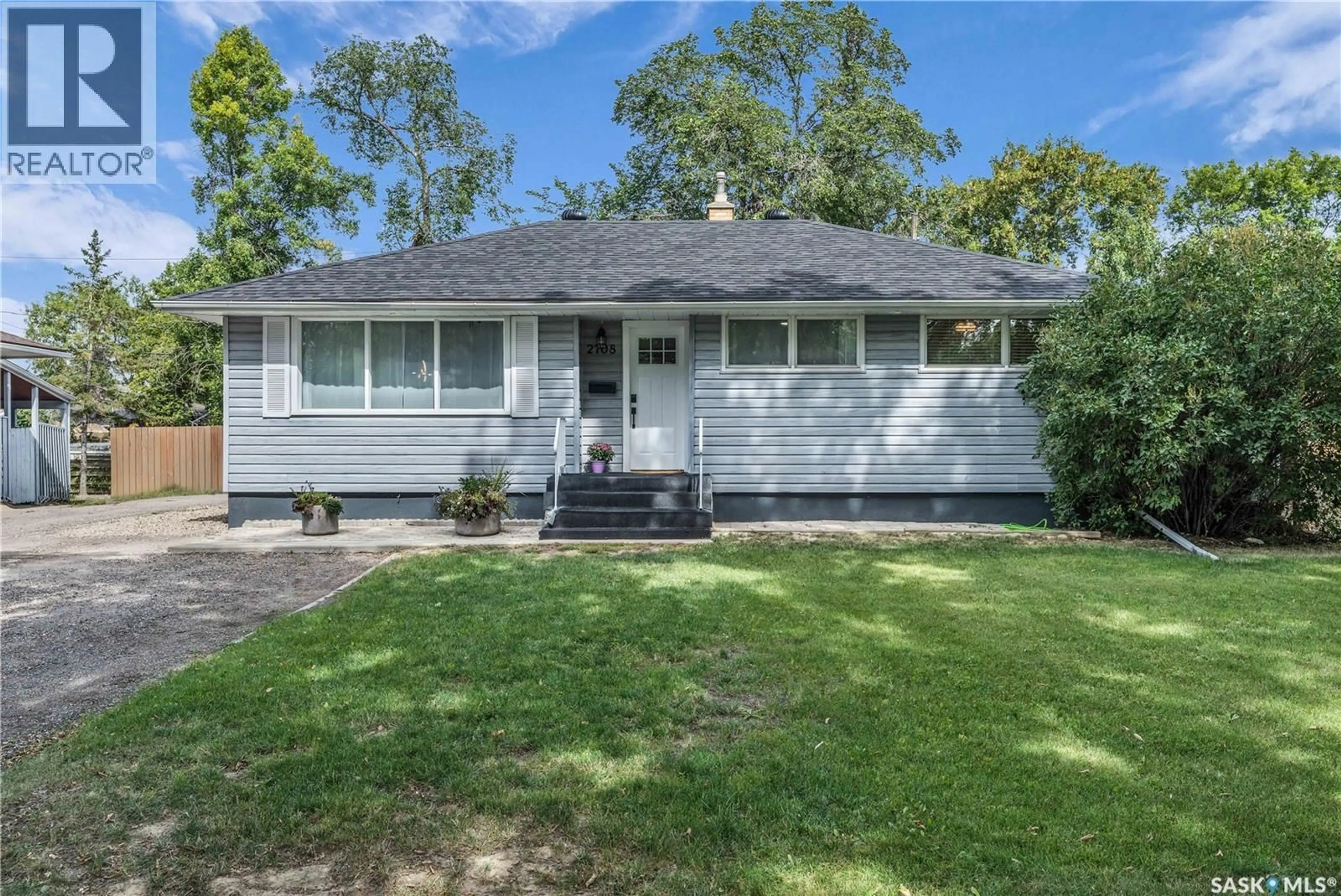 Home with vinyl exterior material, street for 2708 GRANT ROAD, Regina Saskatchewan S4S5T5