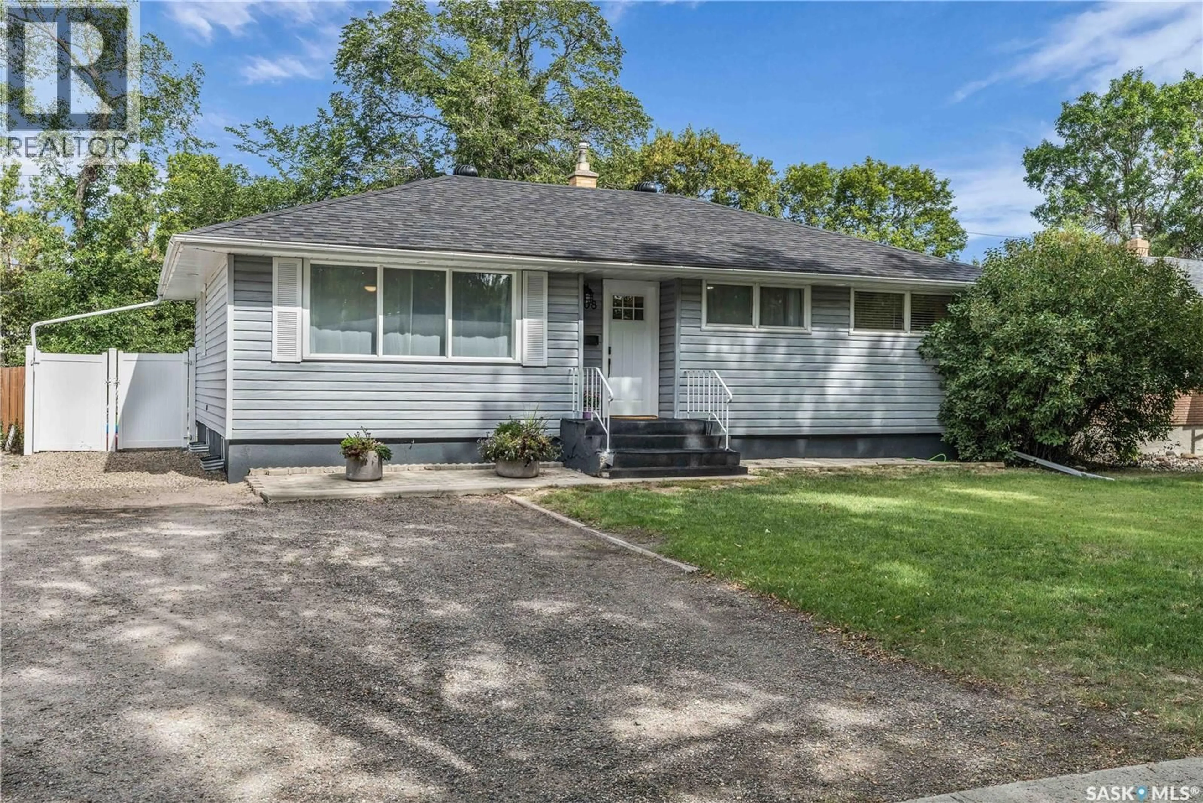 Home with vinyl exterior material, street for 2708 GRANT ROAD, Regina Saskatchewan S4S5T5