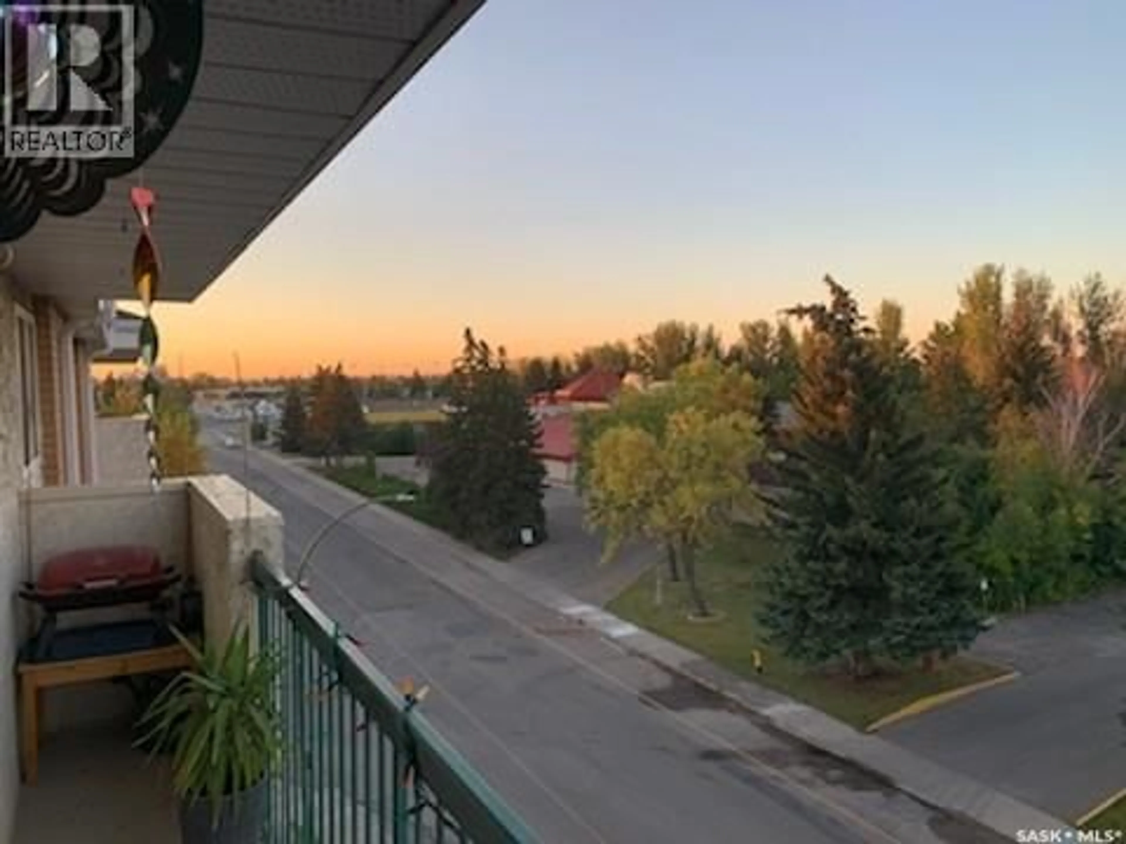 Balcony in the apartment, city buildings view from balcony for 403 301 CREE CRESCENT, Saskatoon Saskatchewan S7K7Y3