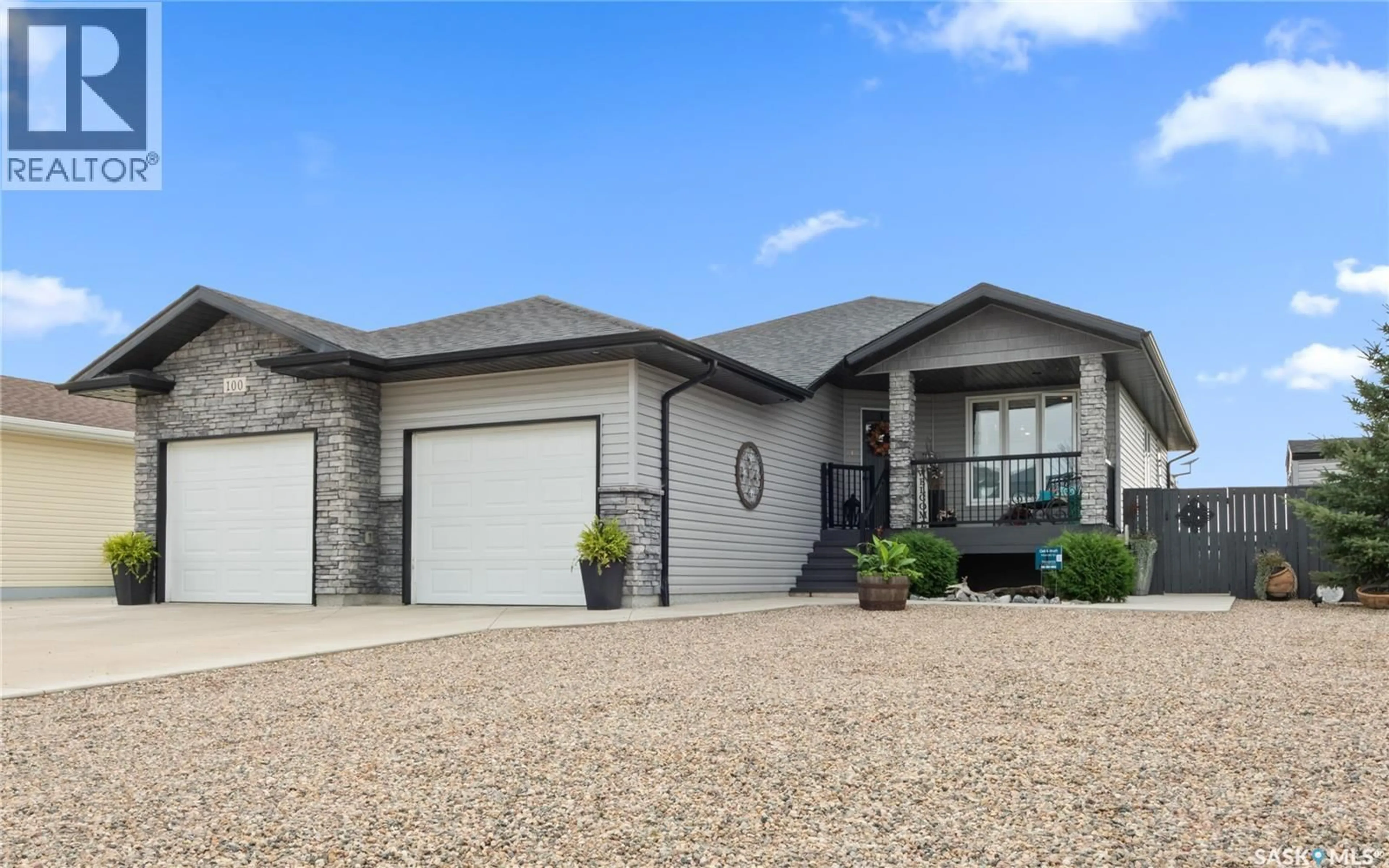 Home with vinyl exterior material, street for 100 DIEFENBAKER AVENUE, Hague Saskatchewan S0K1X0