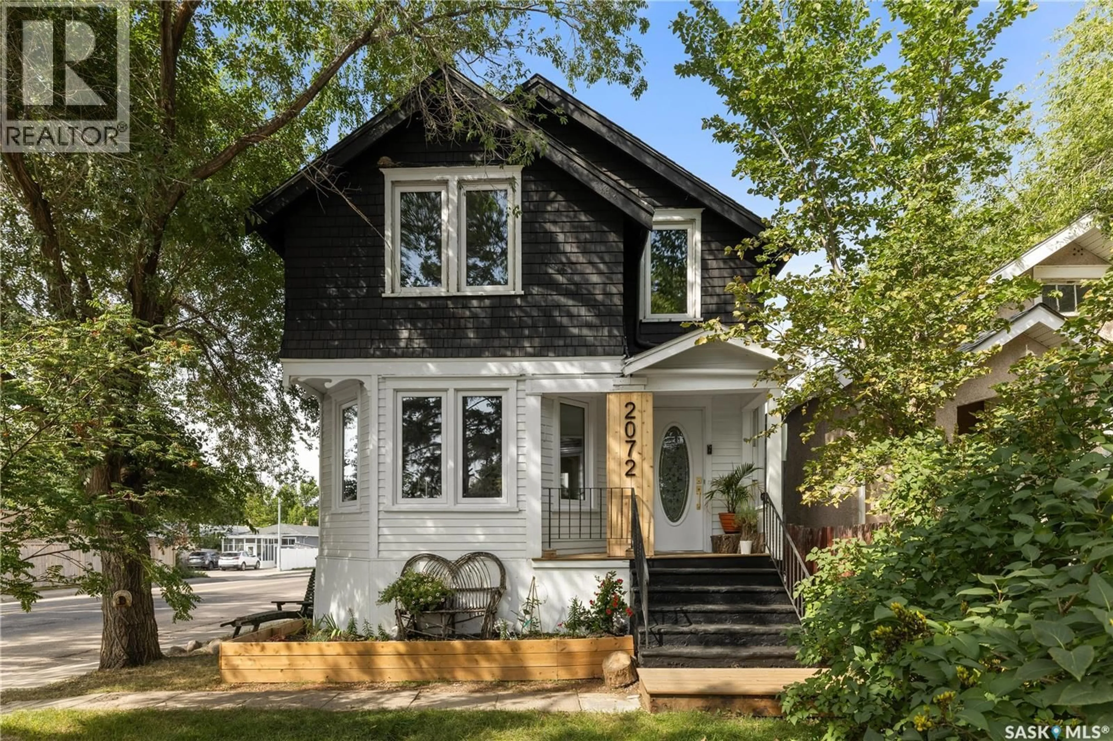 Home with vinyl exterior material, street for 2072 PRINCESS STREET, Regina Saskatchewan S4T3Z4