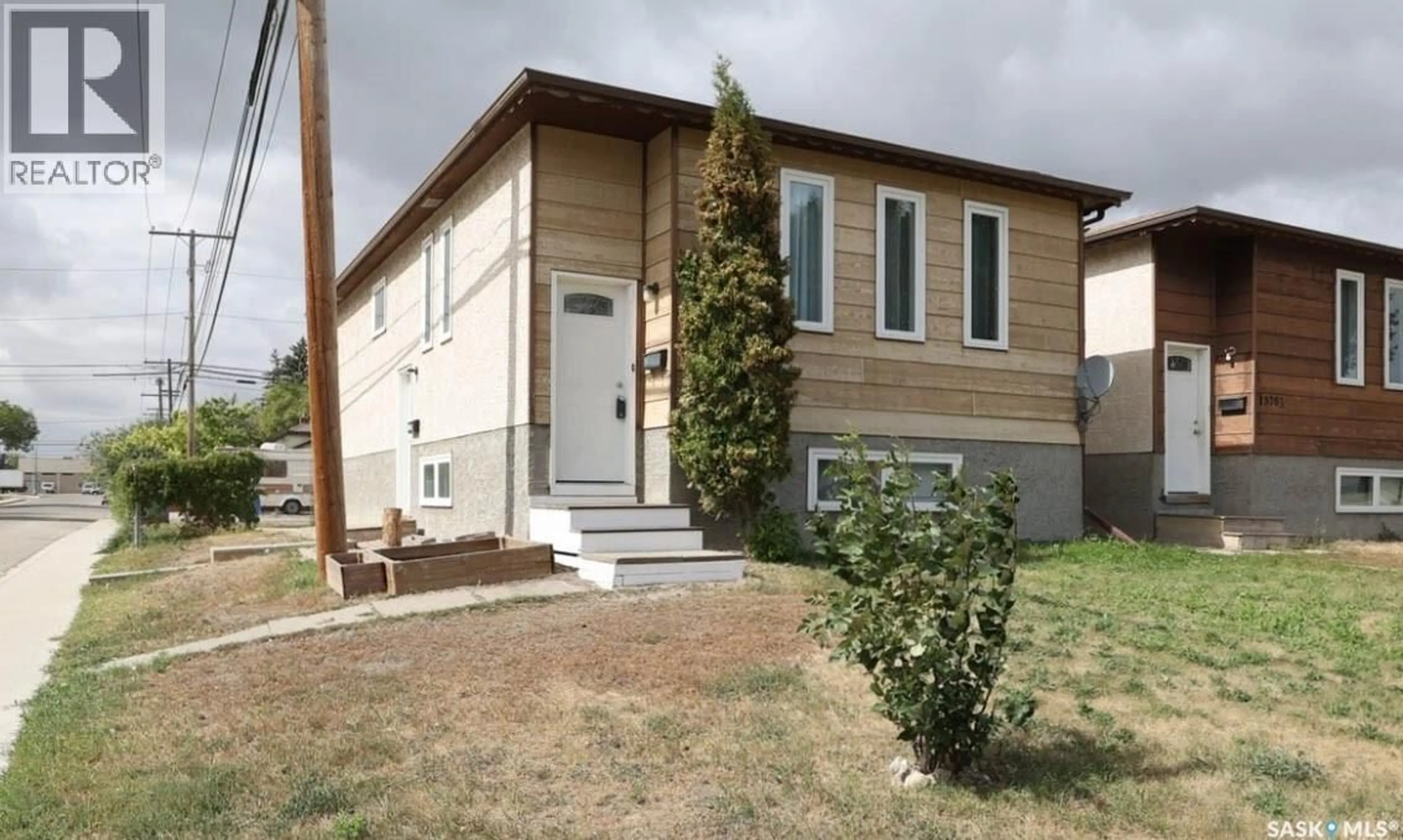 Home with vinyl exterior material, street for 1580 LACON STREET, Regina Saskatchewan S4N1Z4