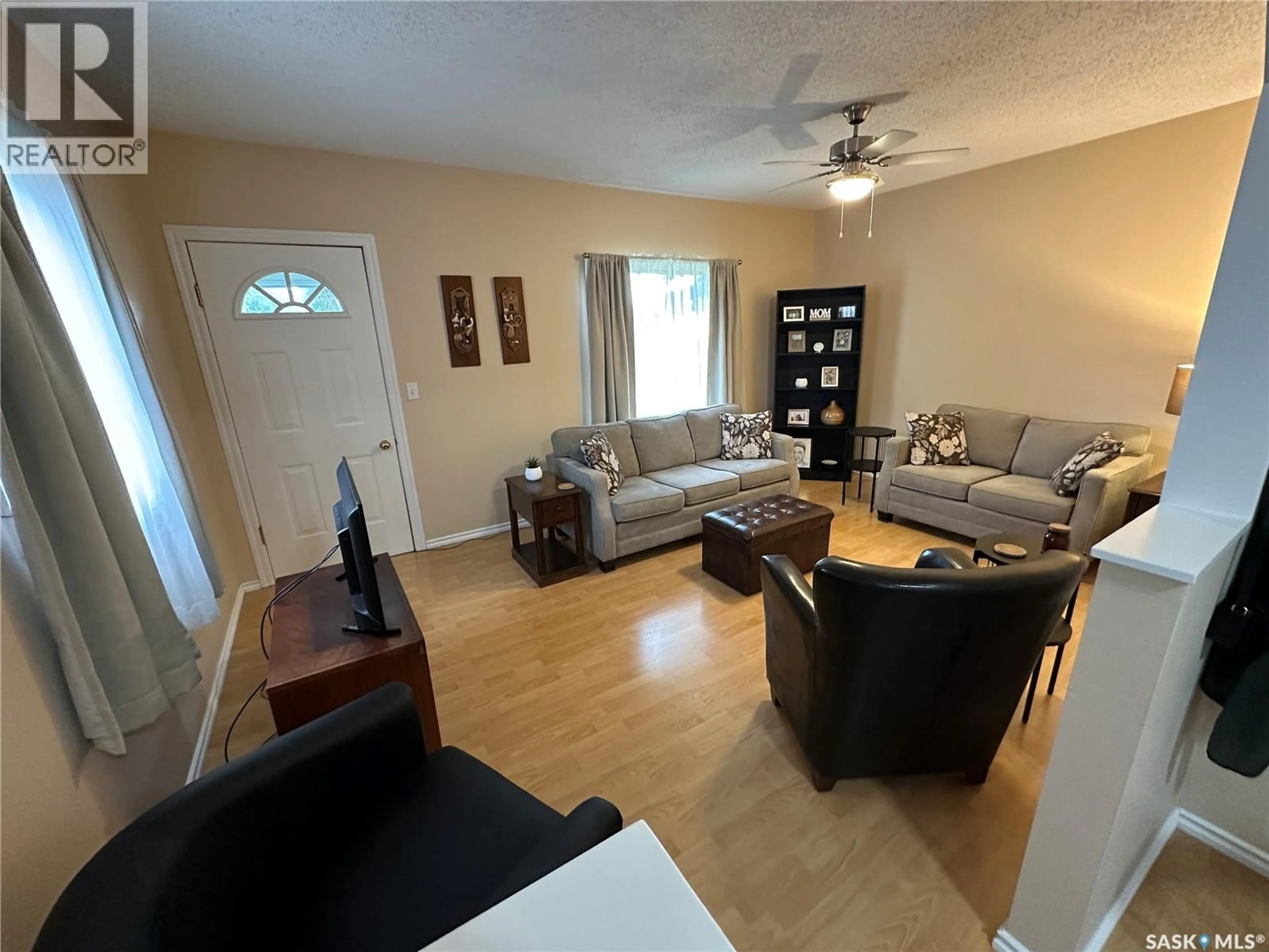 Living room with furniture, unknown for 2002 3RD STREET, Rosthern Saskatchewan S0K3R0