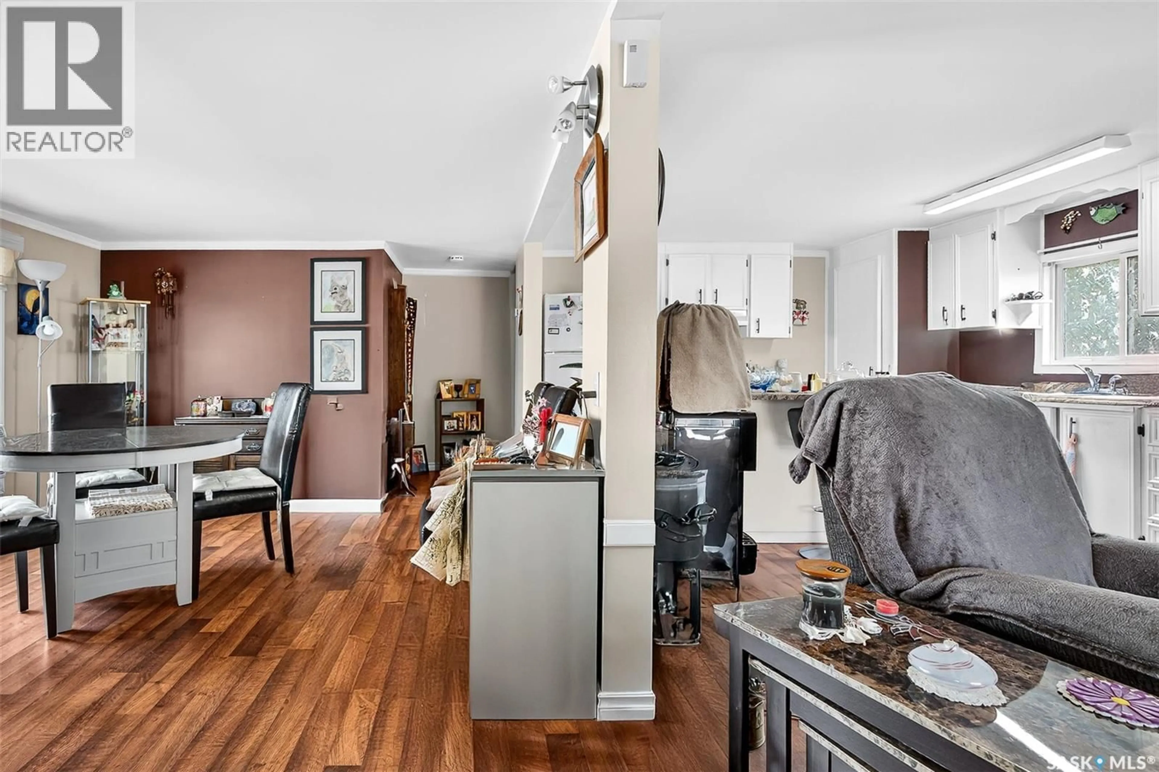 Open concept kitchen, wood/laminate floor for B19 - 1455 9TH AVENUE, Moose Jaw Saskatchewan S6H1C6