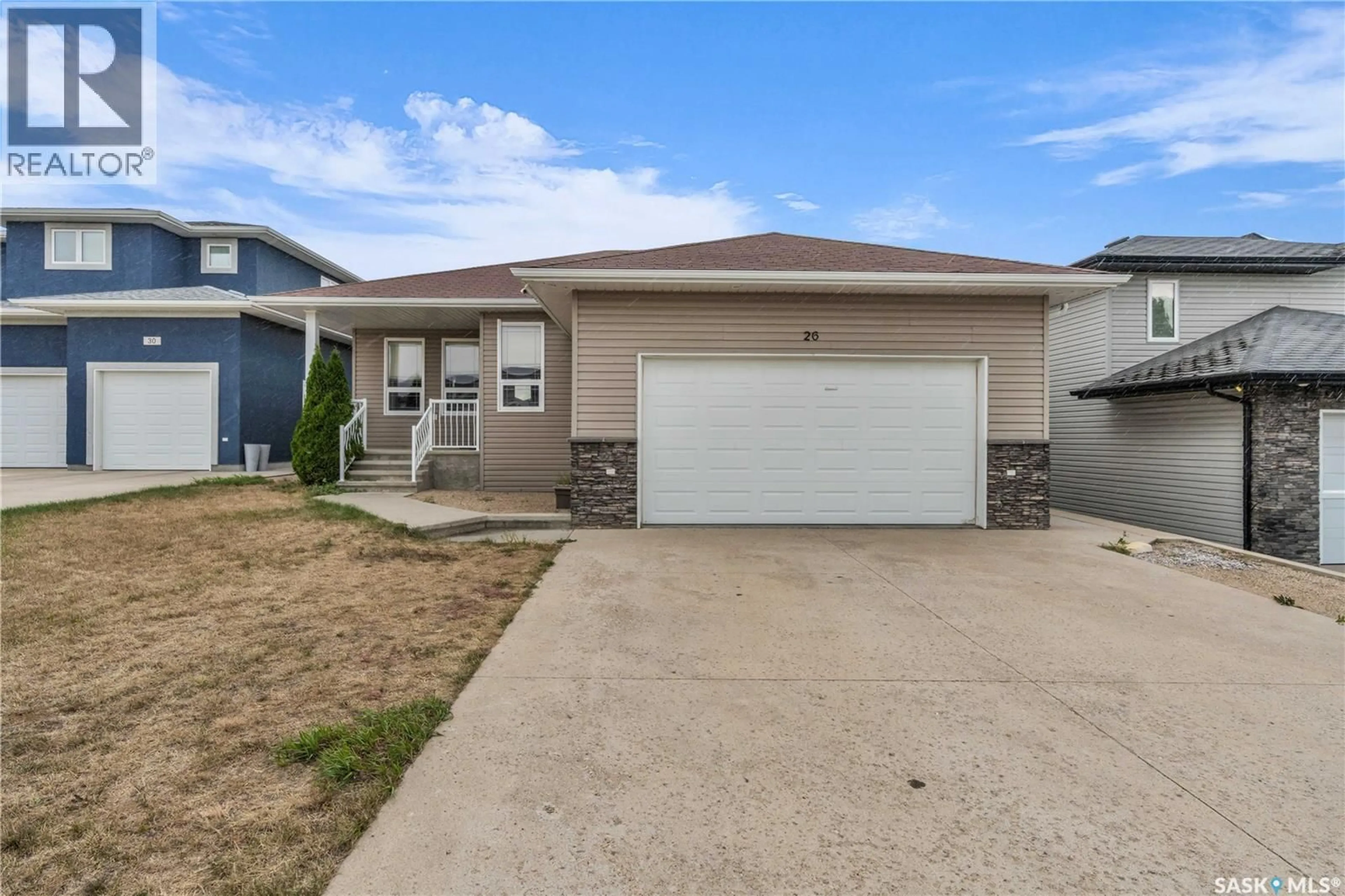 Home with vinyl exterior material, street for 26 BERKSHIRE COURT, Moose Jaw Saskatchewan S6K0A1