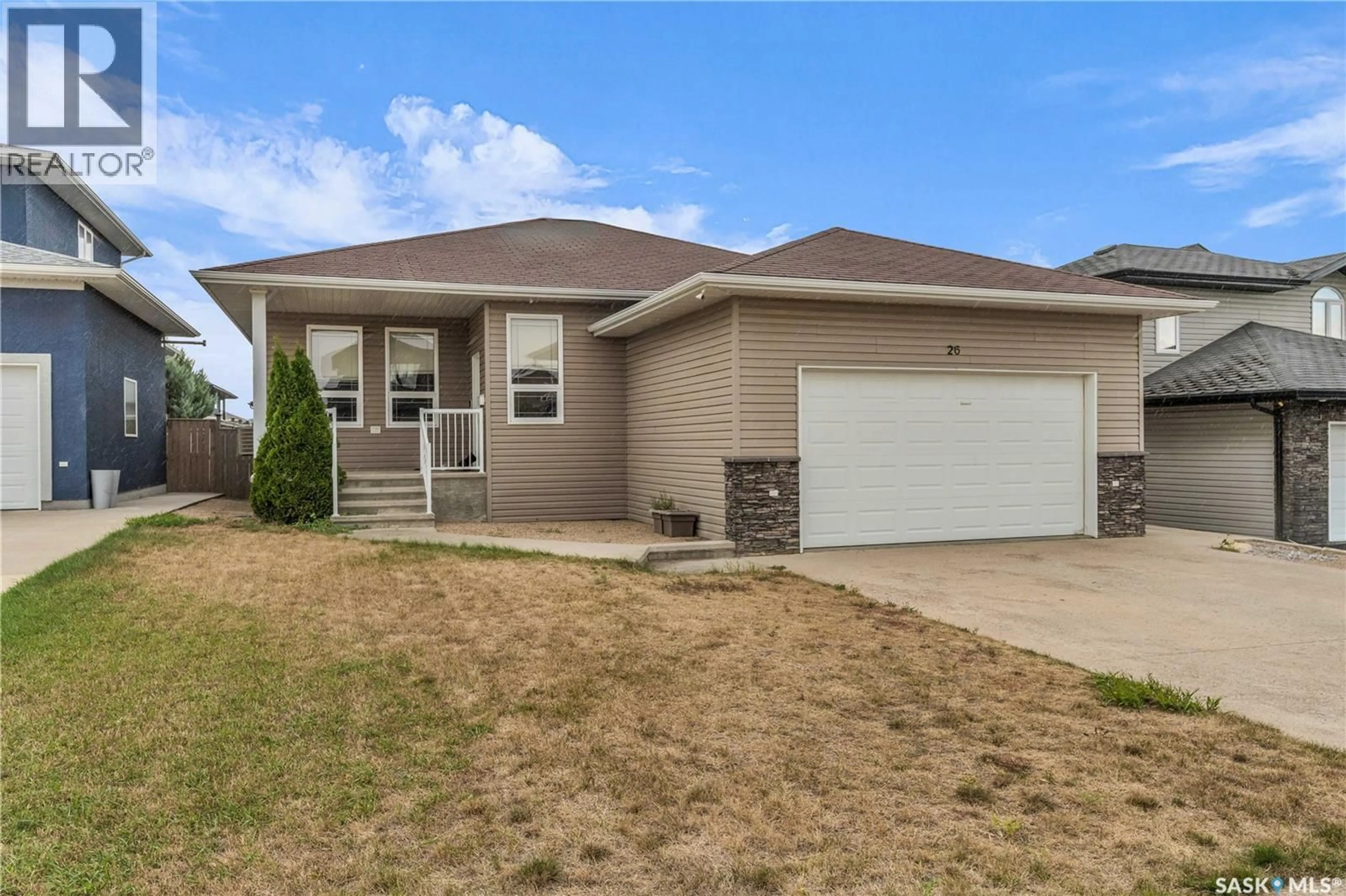Home with vinyl exterior material, street for 26 BERKSHIRE COURT, Moose Jaw Saskatchewan S6K0A1