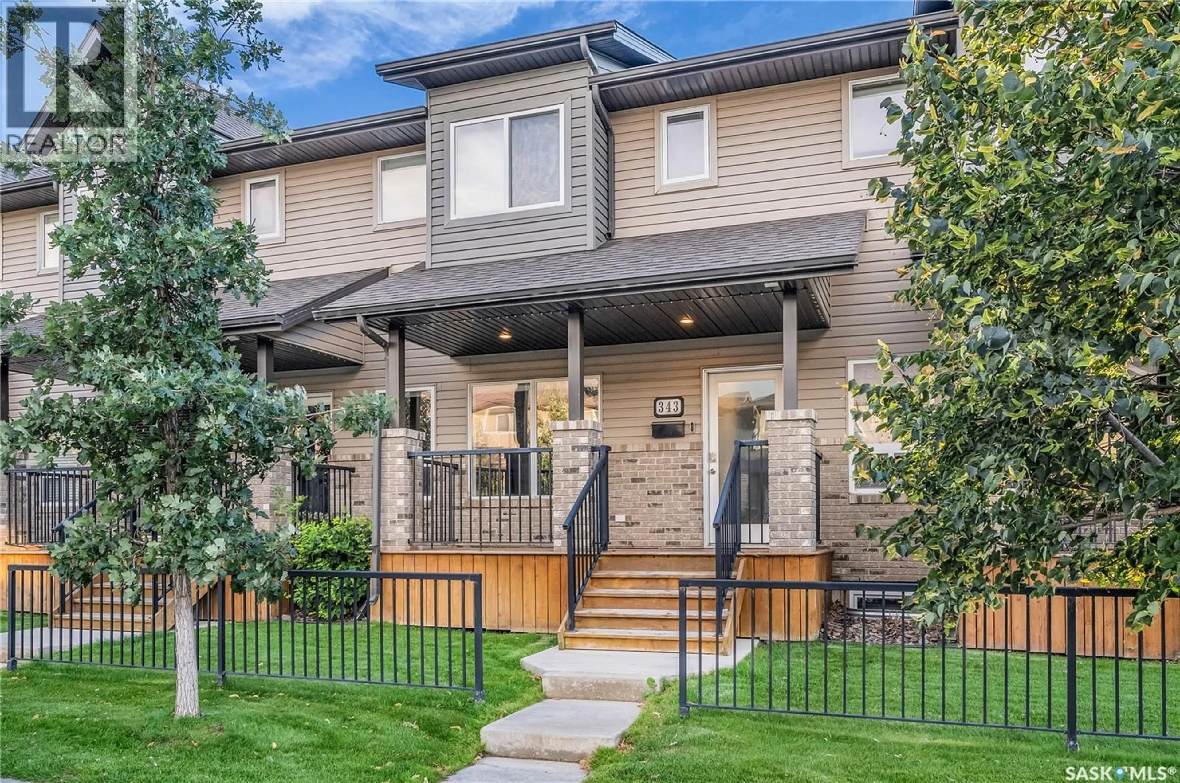 Home with brick exterior material, street for 343 WILLOWGROVE LANE, Saskatoon Saskatchewan S7W0H5