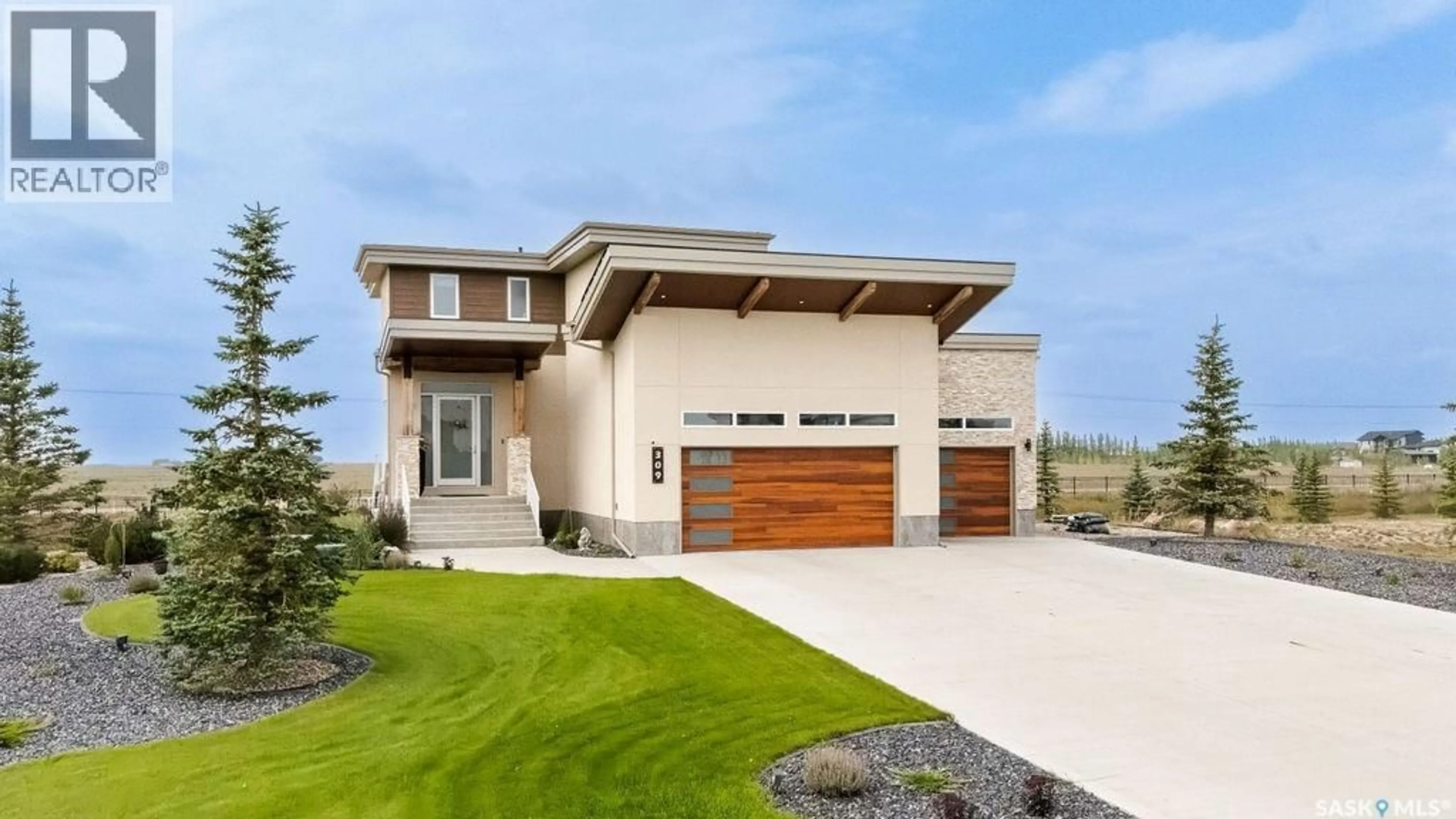 Home with vinyl exterior material, street for 309 SPRUCE CREEK CRESCENT, Edenwold Rm No.158 Saskatchewan S0G3Z0
