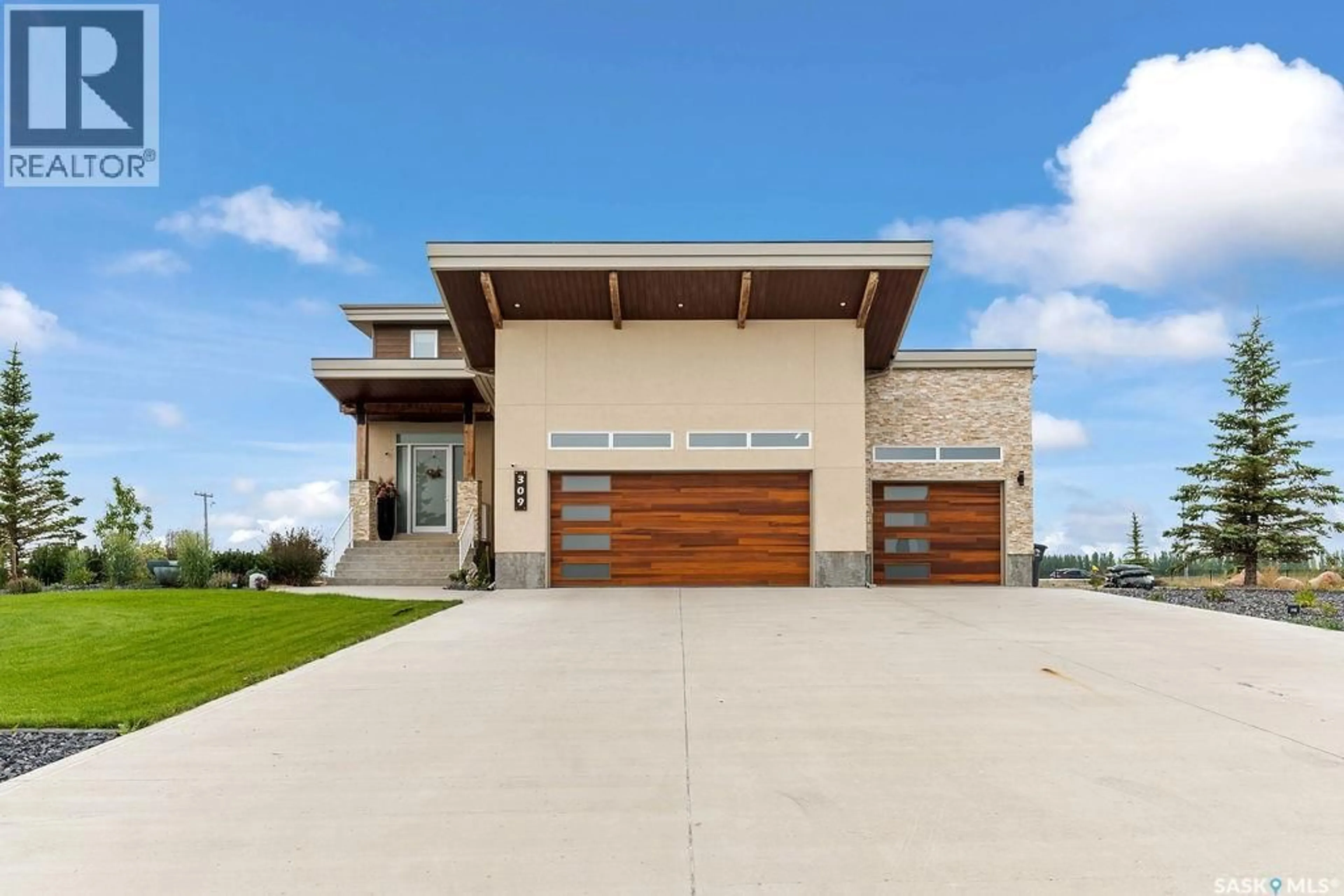 Home with brick exterior material, unknown for 309 SPRUCE CREEK CRESCENT, Edenwold Rm No.158 Saskatchewan S0G3Z0