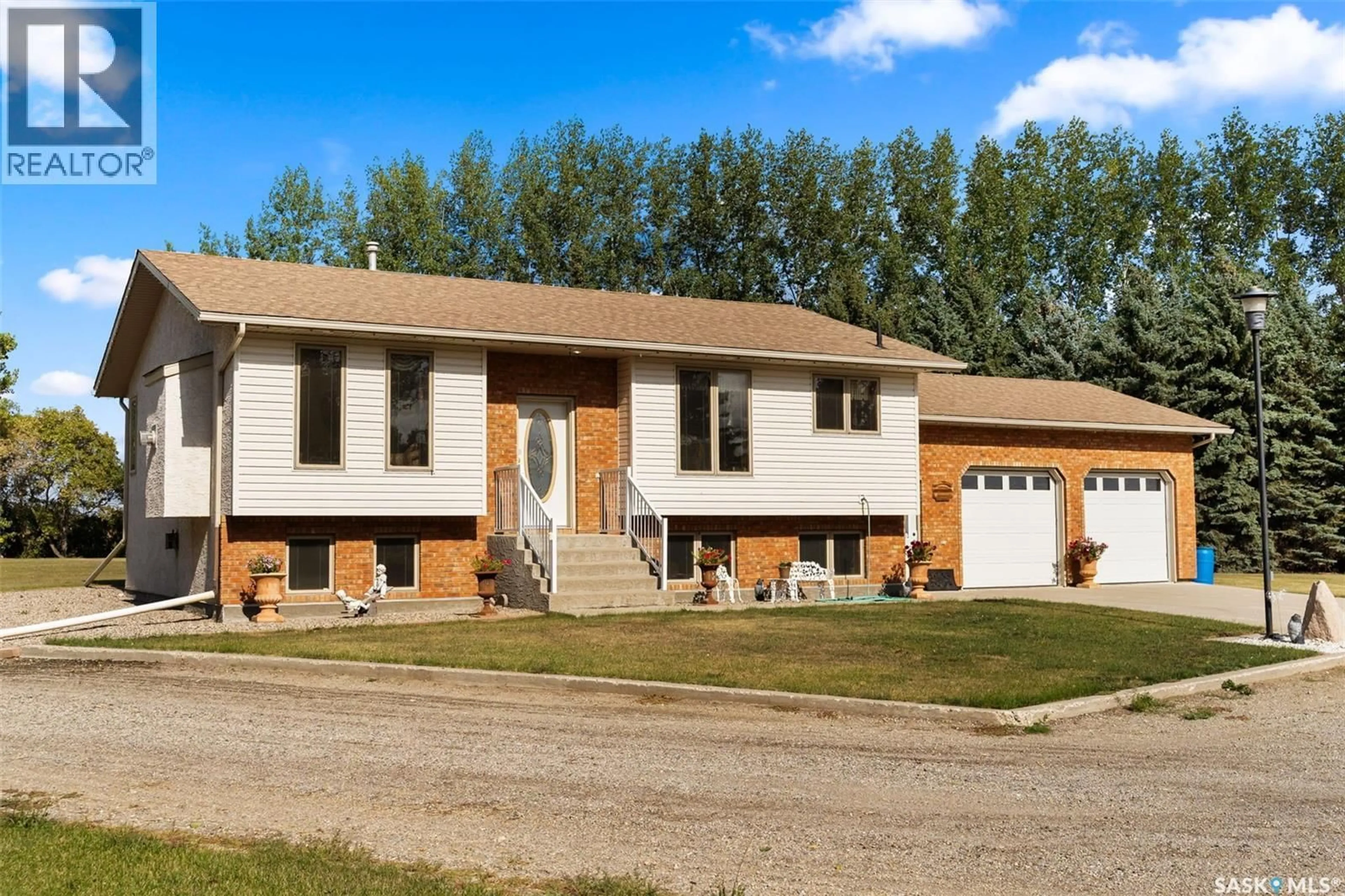 Home with vinyl exterior material, street for ZEHNER ACREAGE, Edenwold Rm No.158 Saskatchewan S0G5K0