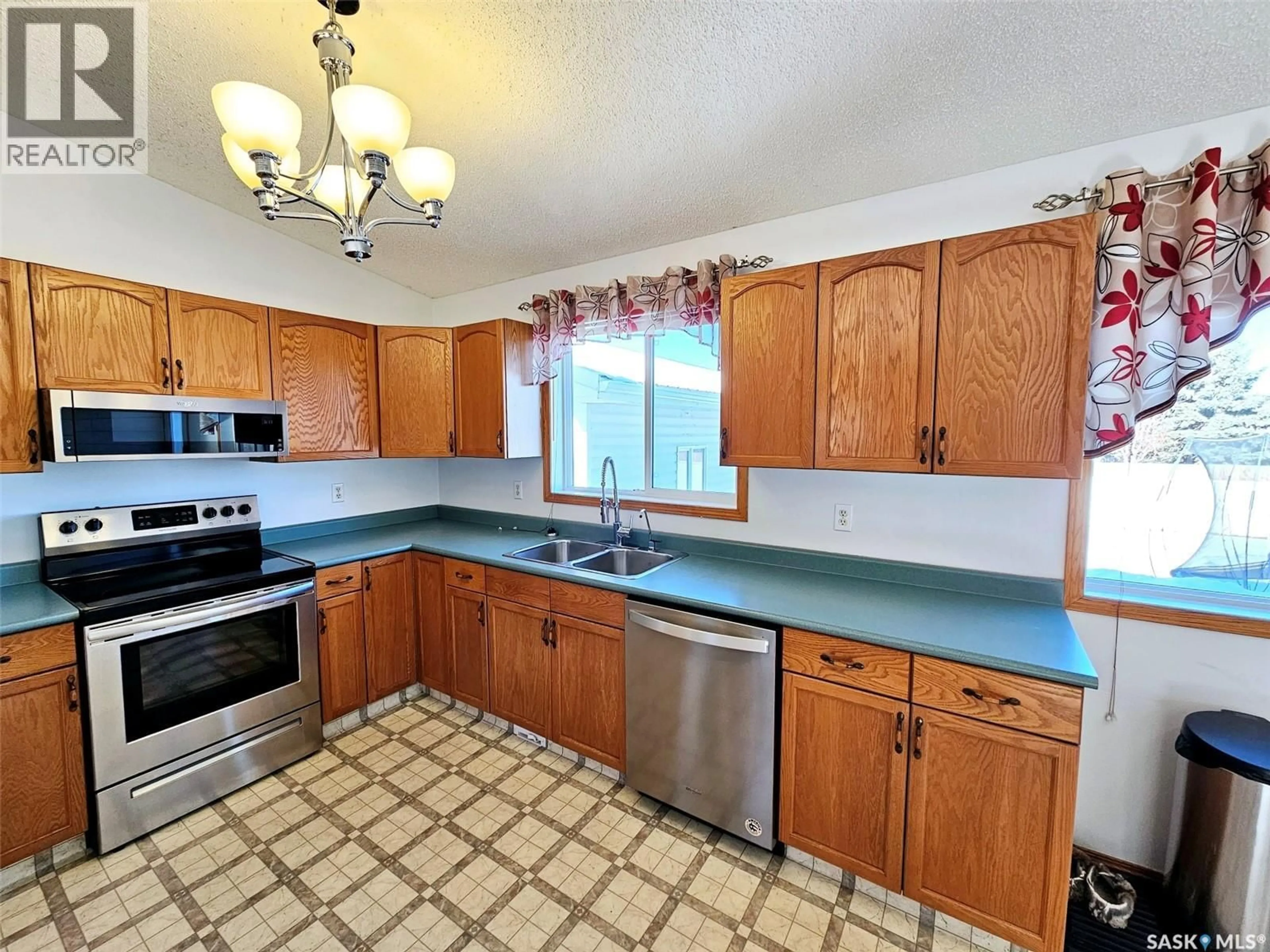 Standard kitchen, ceramic/tile floor for 11 ARCOLA PLACE, Carlyle Saskatchewan S0C0R0