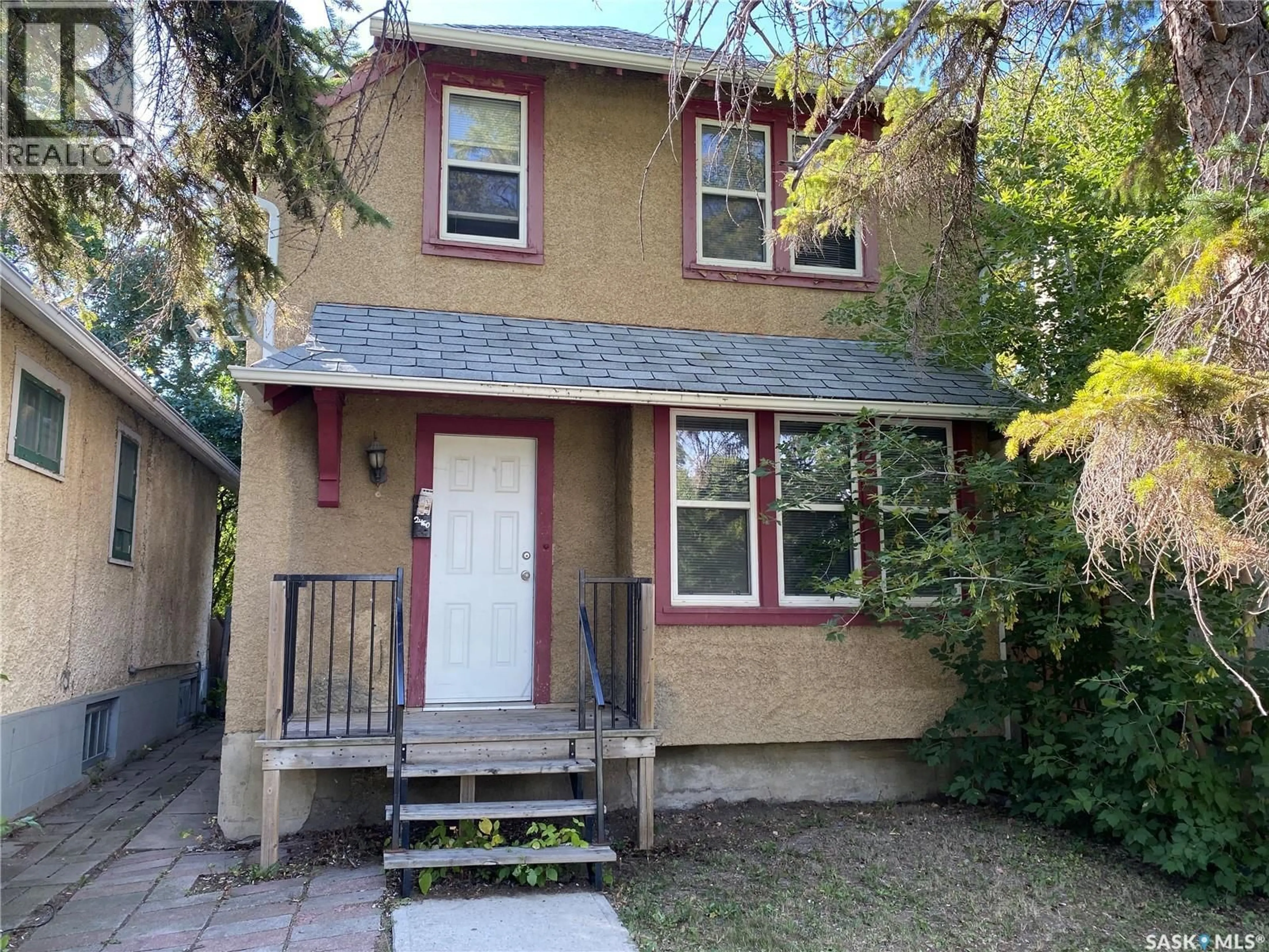 Home with vinyl exterior material, street for 2460 WALLACE STREET, Regina Saskatchewan S4N4B3