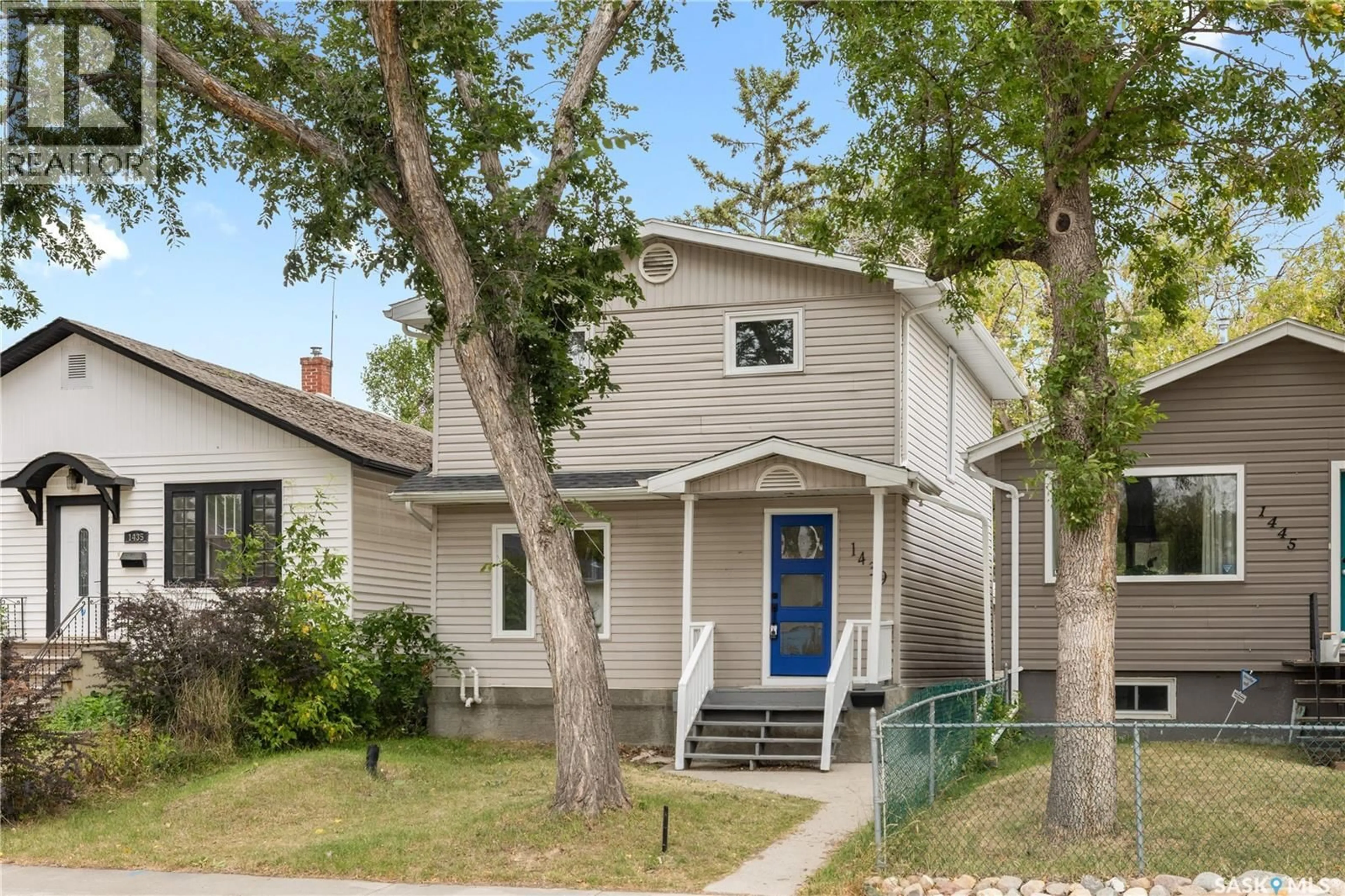 Home with vinyl exterior material, street for 1439 CONNAUGHT STREET, Regina Saskatchewan S4T4T1