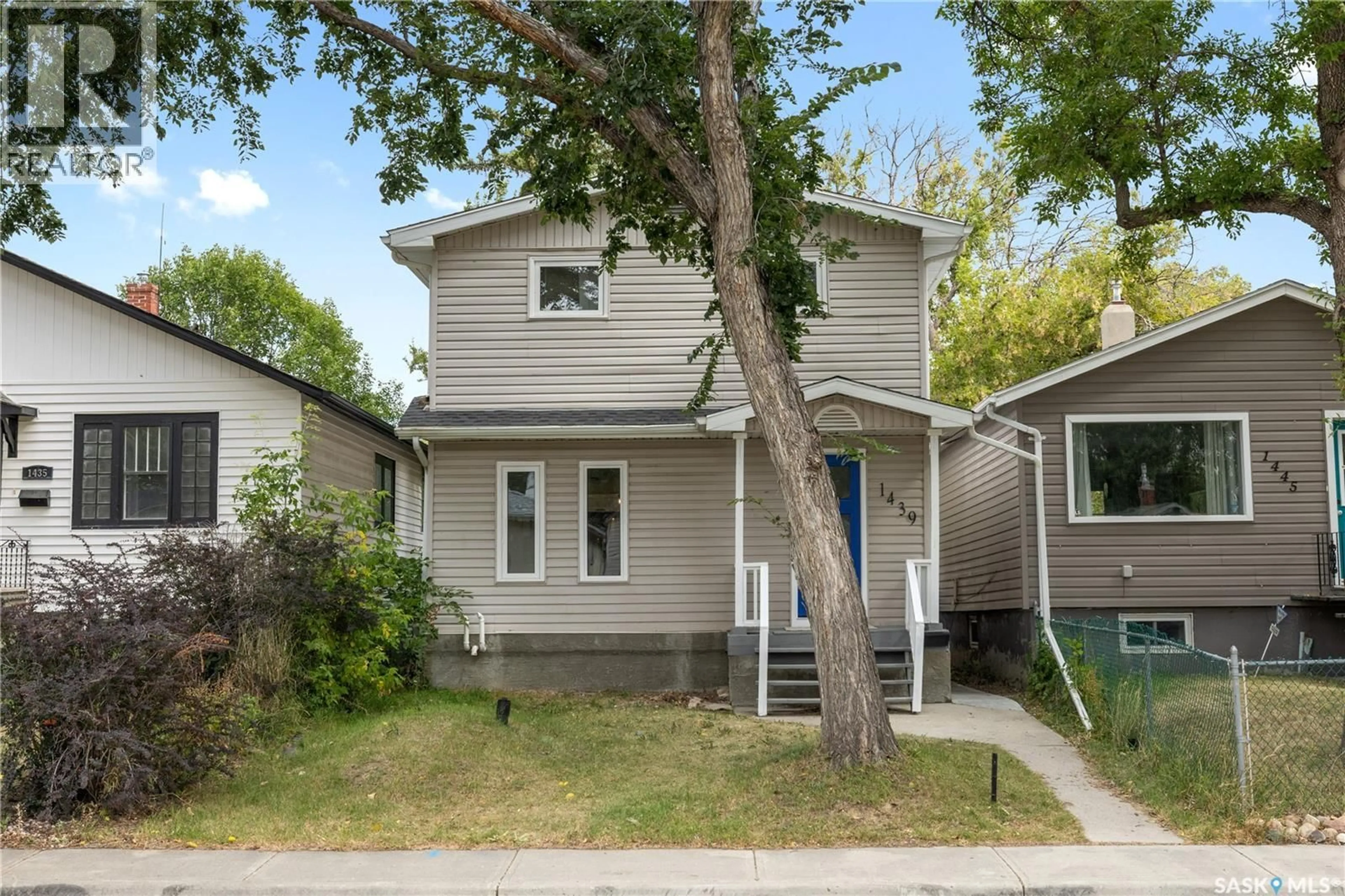 Home with vinyl exterior material, street for 1439 CONNAUGHT STREET, Regina Saskatchewan S4T4T1