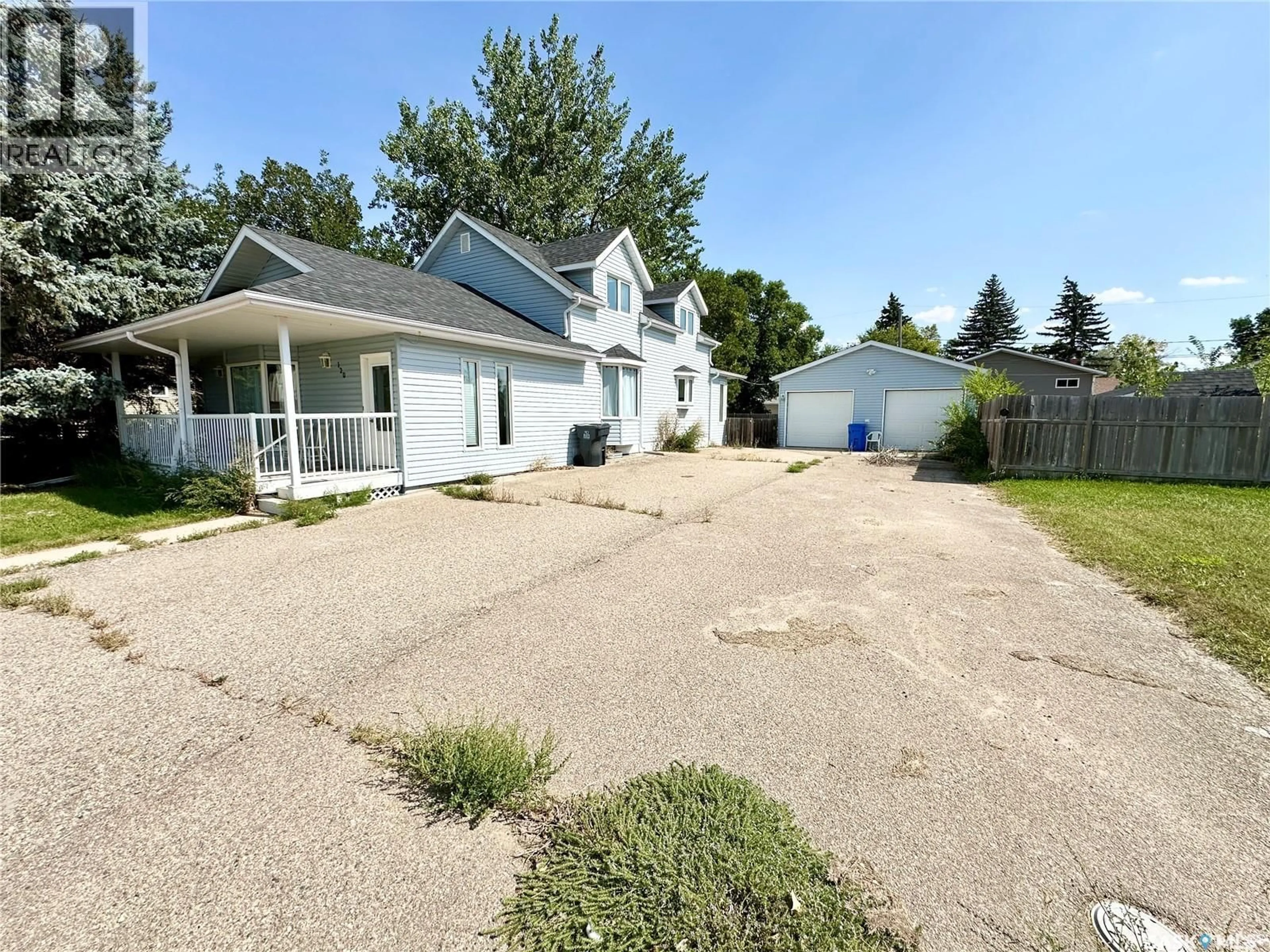 A pic from outside/outdoor area/front of a property/back of a property/a pic from drone, street for 120 MAIN STREET, Midale Saskatchewan S0C1S0