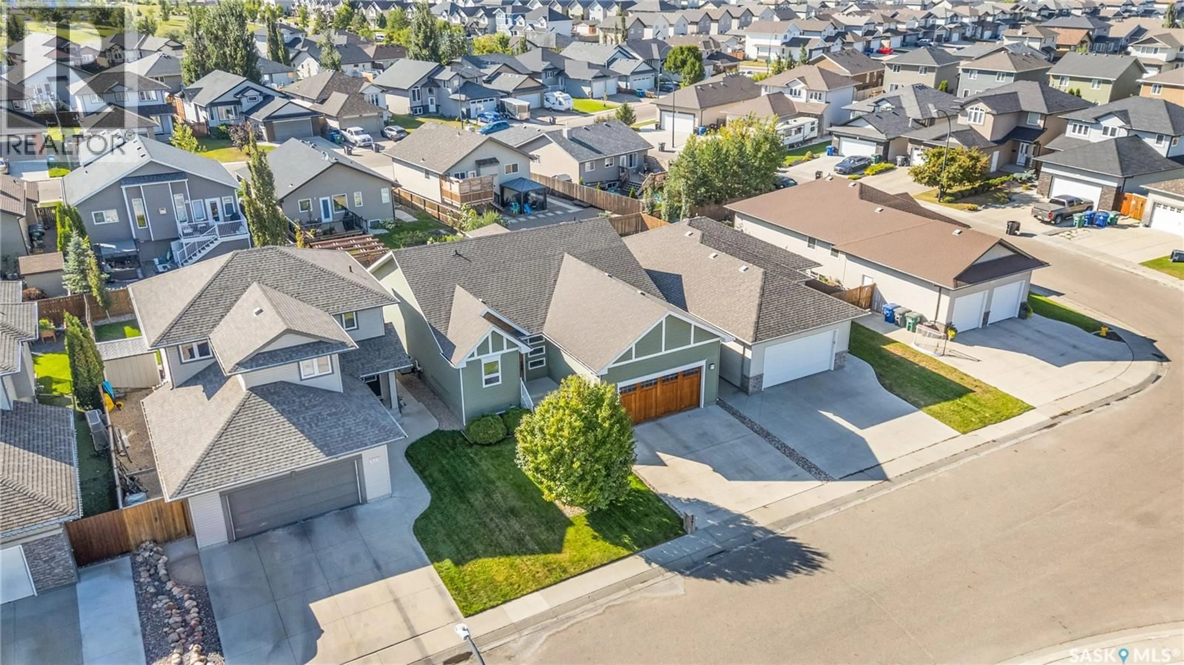 A pic from outside/outdoor area/front of a property/back of a property/a pic from drone, street for 527 ALLWOOD MANOR, Saskatoon Saskatchewan S7R0A5