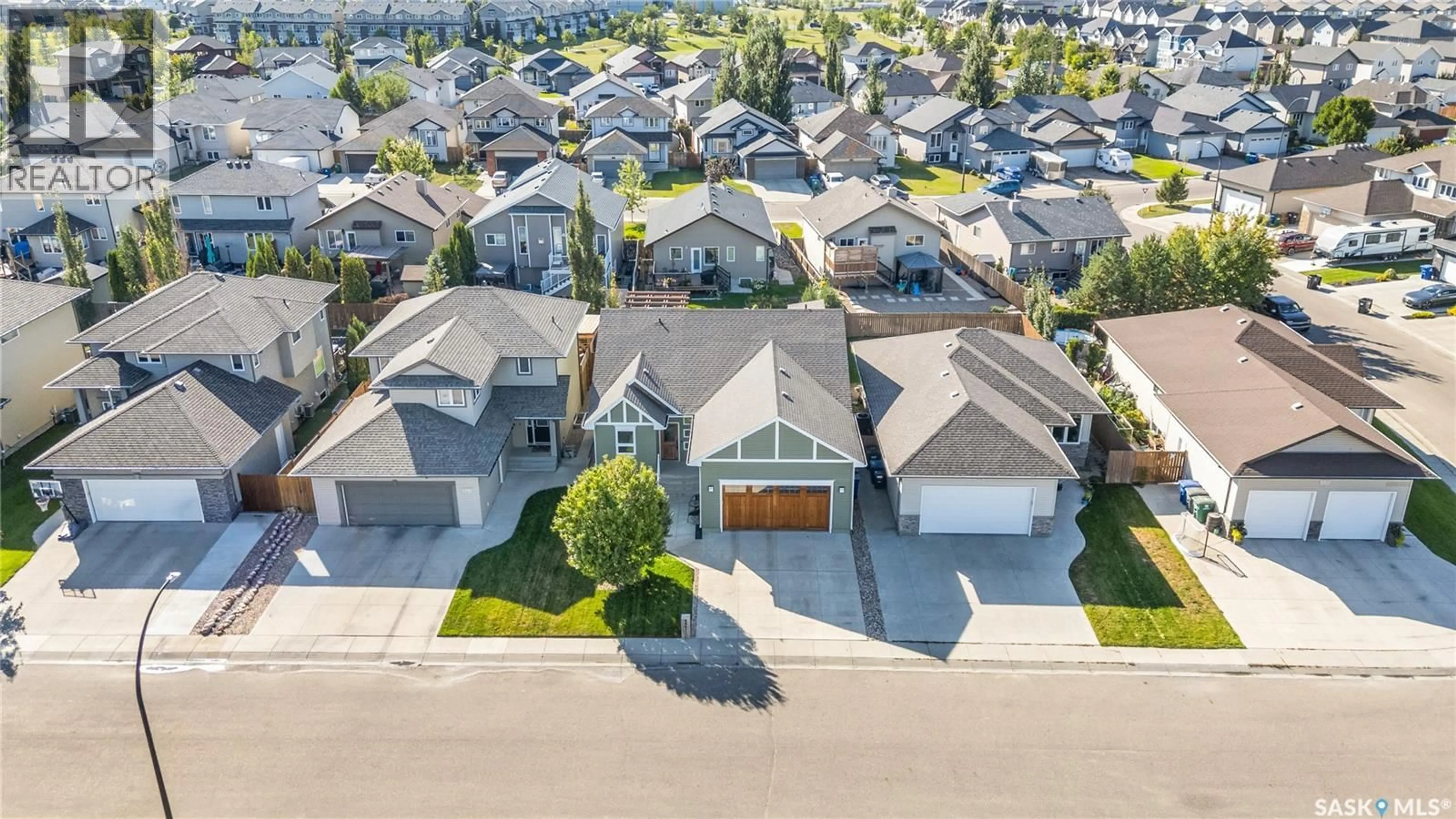 A pic from outside/outdoor area/front of a property/back of a property/a pic from drone, street for 527 ALLWOOD MANOR, Saskatoon Saskatchewan S7R0A5