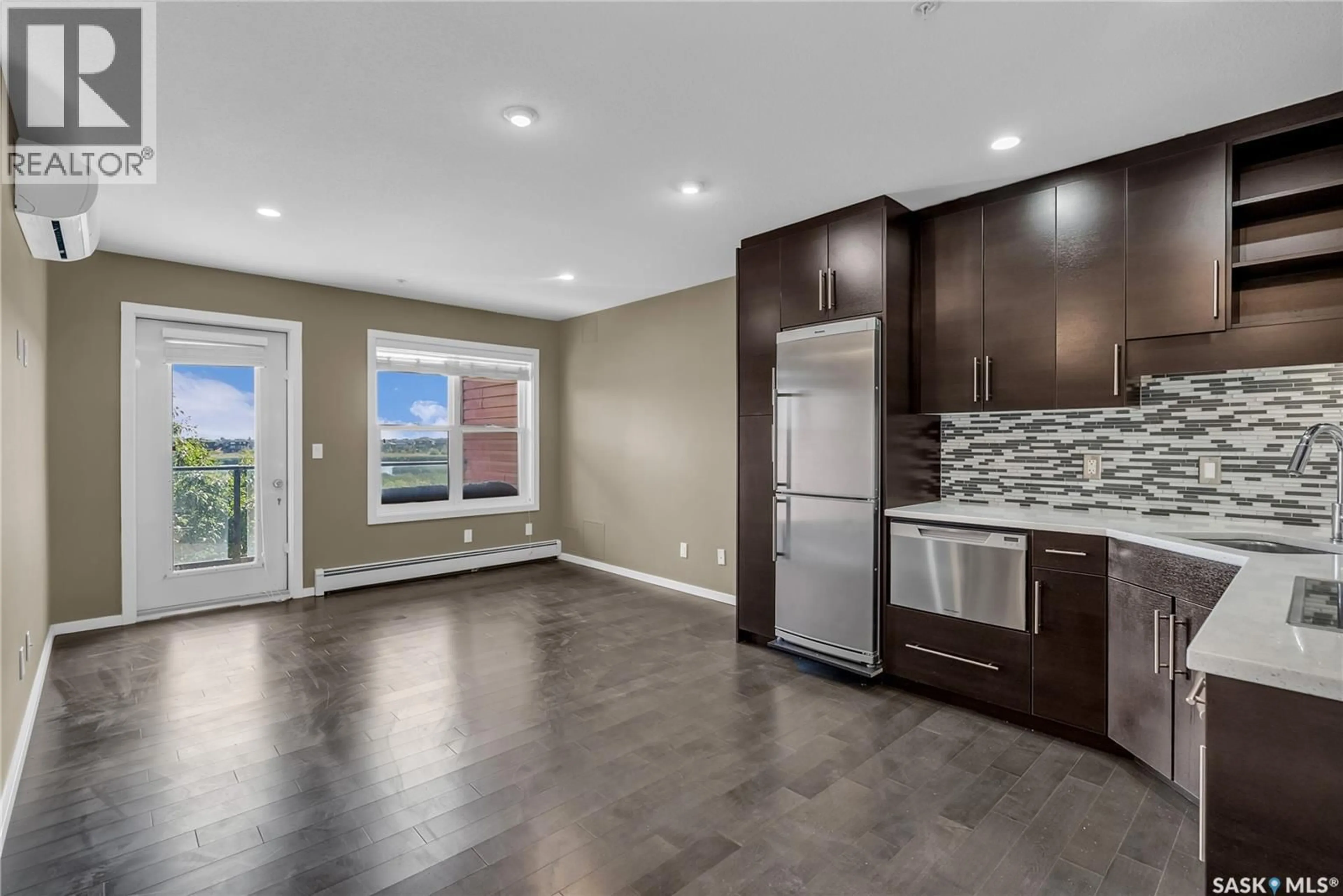 Open concept kitchen, unknown for 230 - 311 SLIMMON ROAD, Saskatoon Saskatchewan S7V0B3