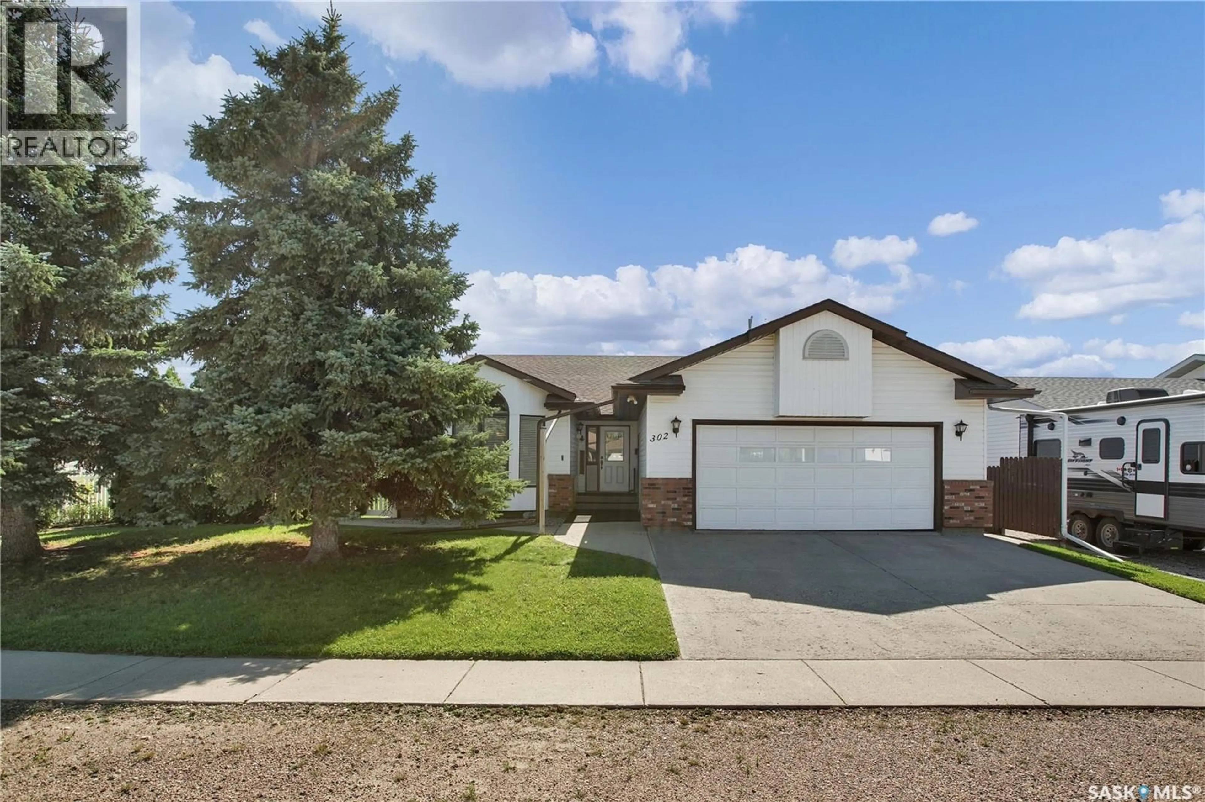 Home with vinyl exterior material, street for 302 6TH STREET, Hague Saskatchewan S0K1X0