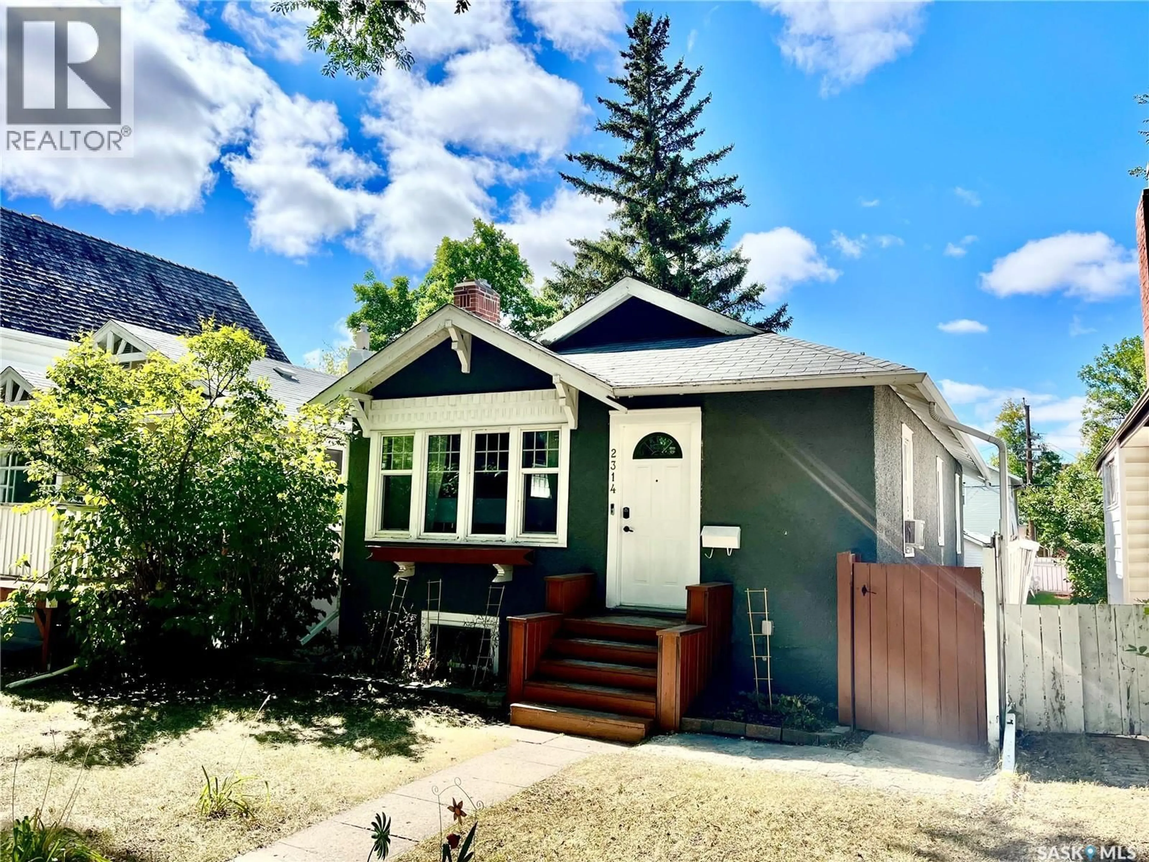 Home with vinyl exterior material, street for 2314 ELPHINSTONE STREET, Regina Saskatchewan S4T3P1
