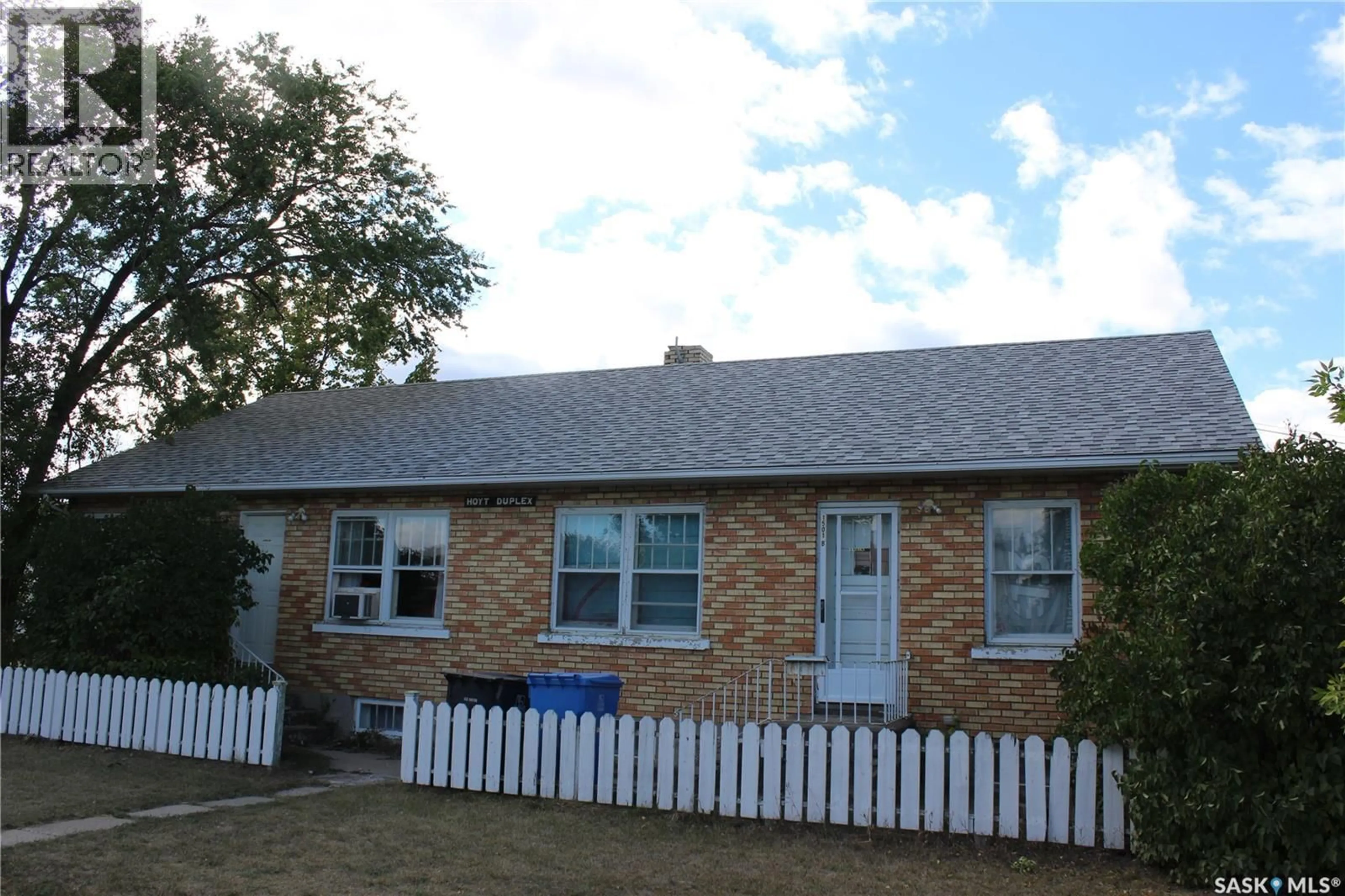 Home with vinyl exterior material, street for 1501 3RD STREET, Estevan Saskatchewan S4A0S5